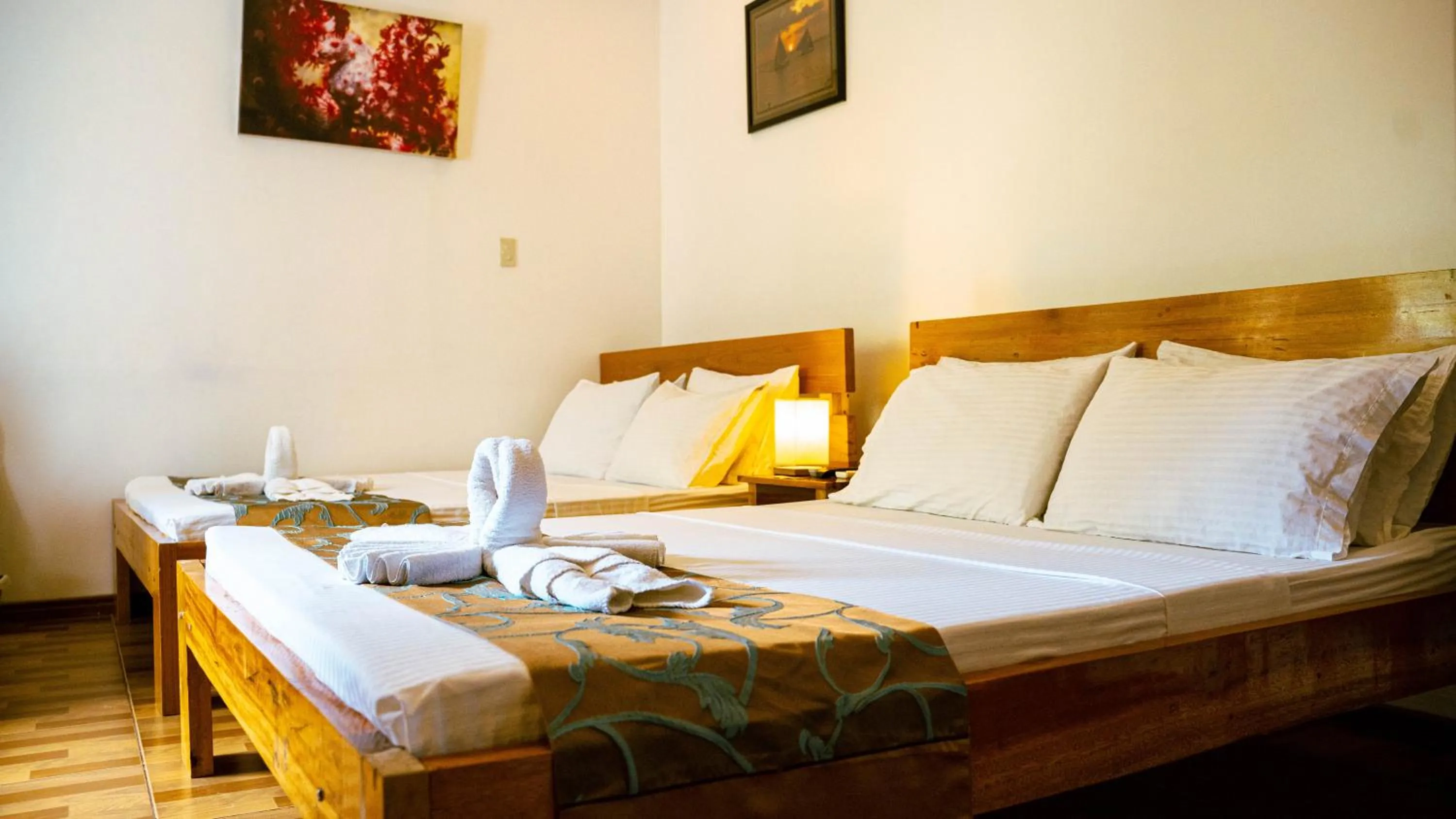 Bed in DiveGurus Boracay Beach Resort