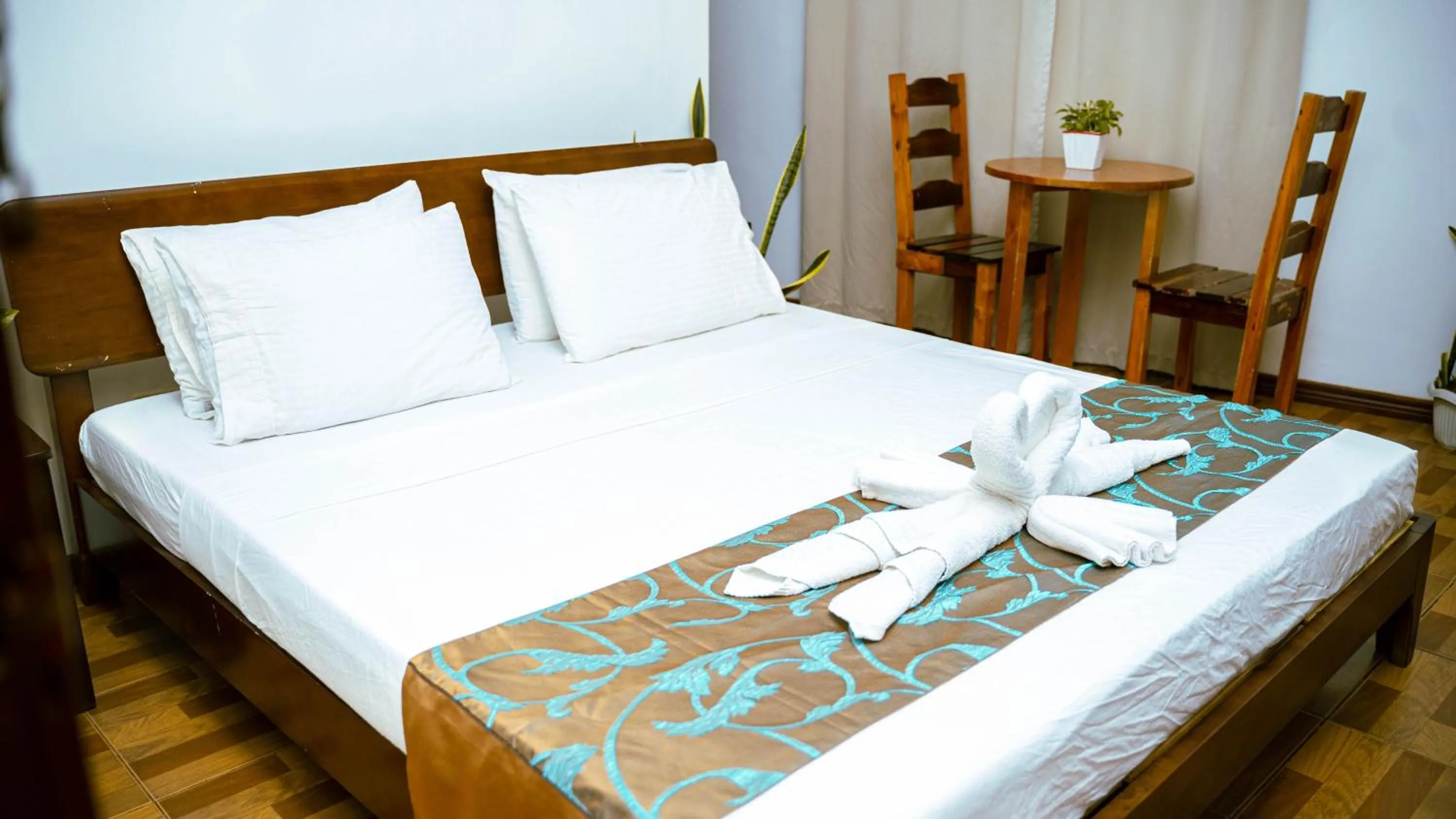 Bed in DiveGurus Boracay Beach Resort