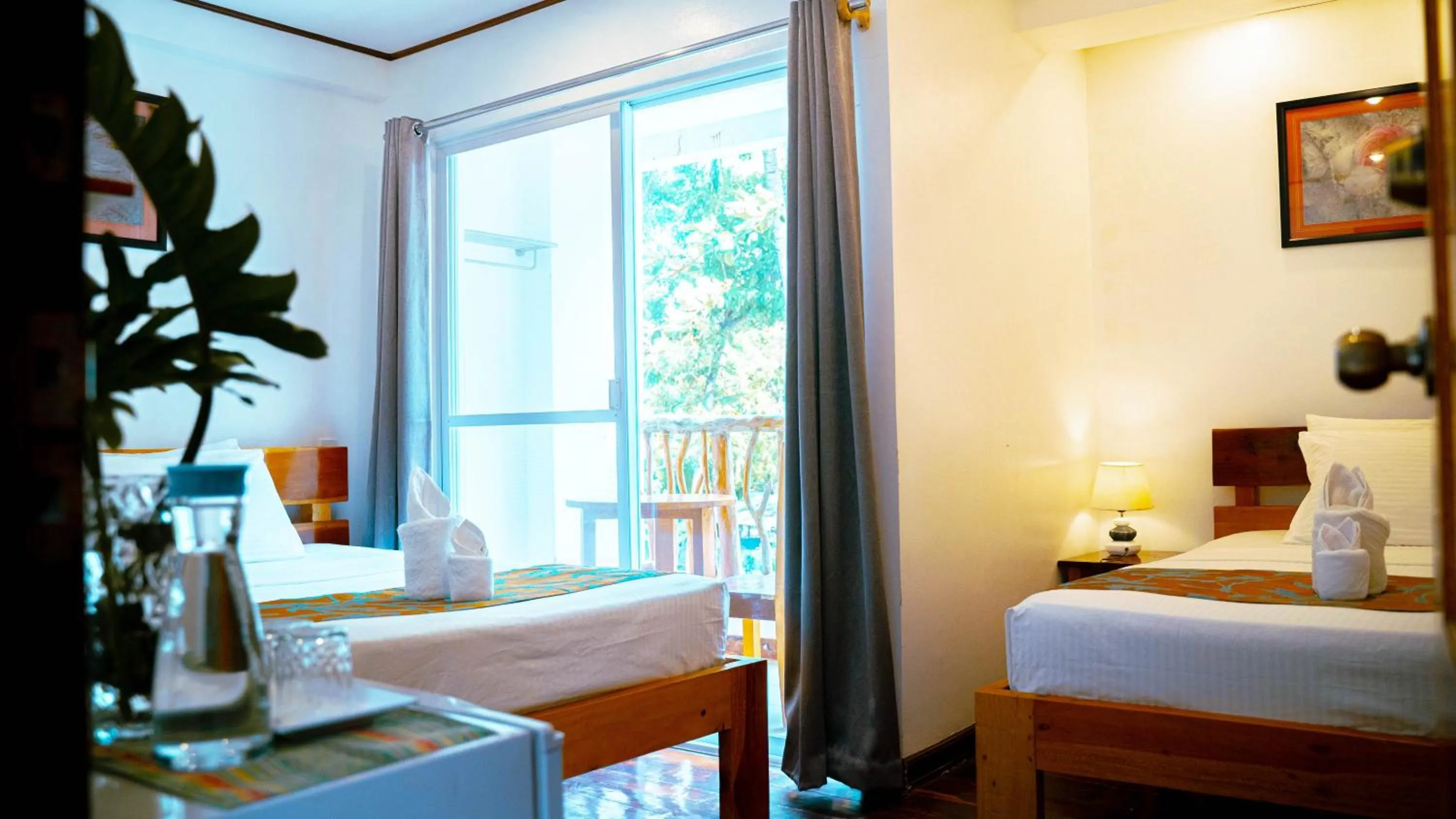 Bed in DiveGurus Boracay Beach Resort