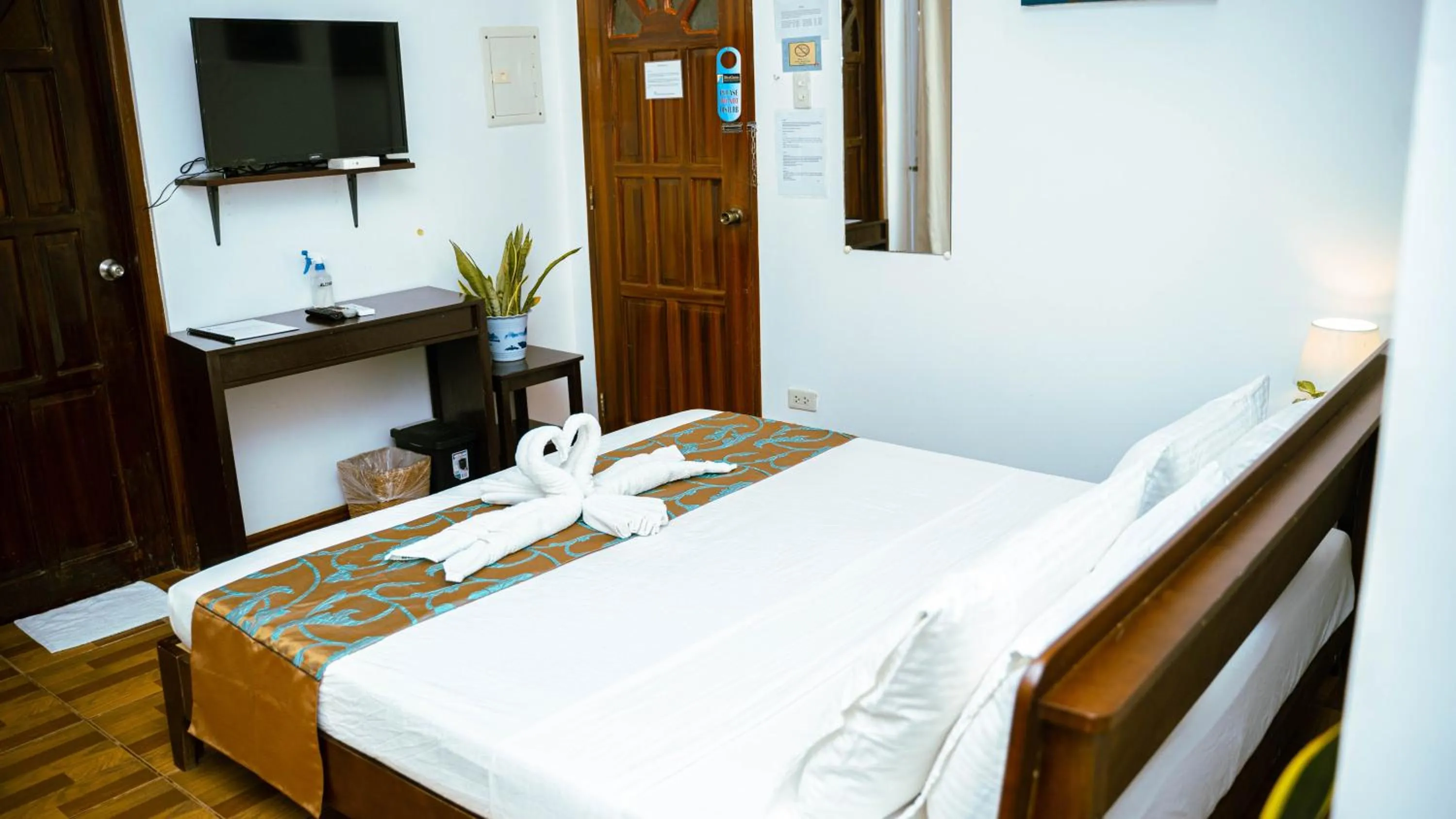 Bed in DiveGurus Boracay Beach Resort