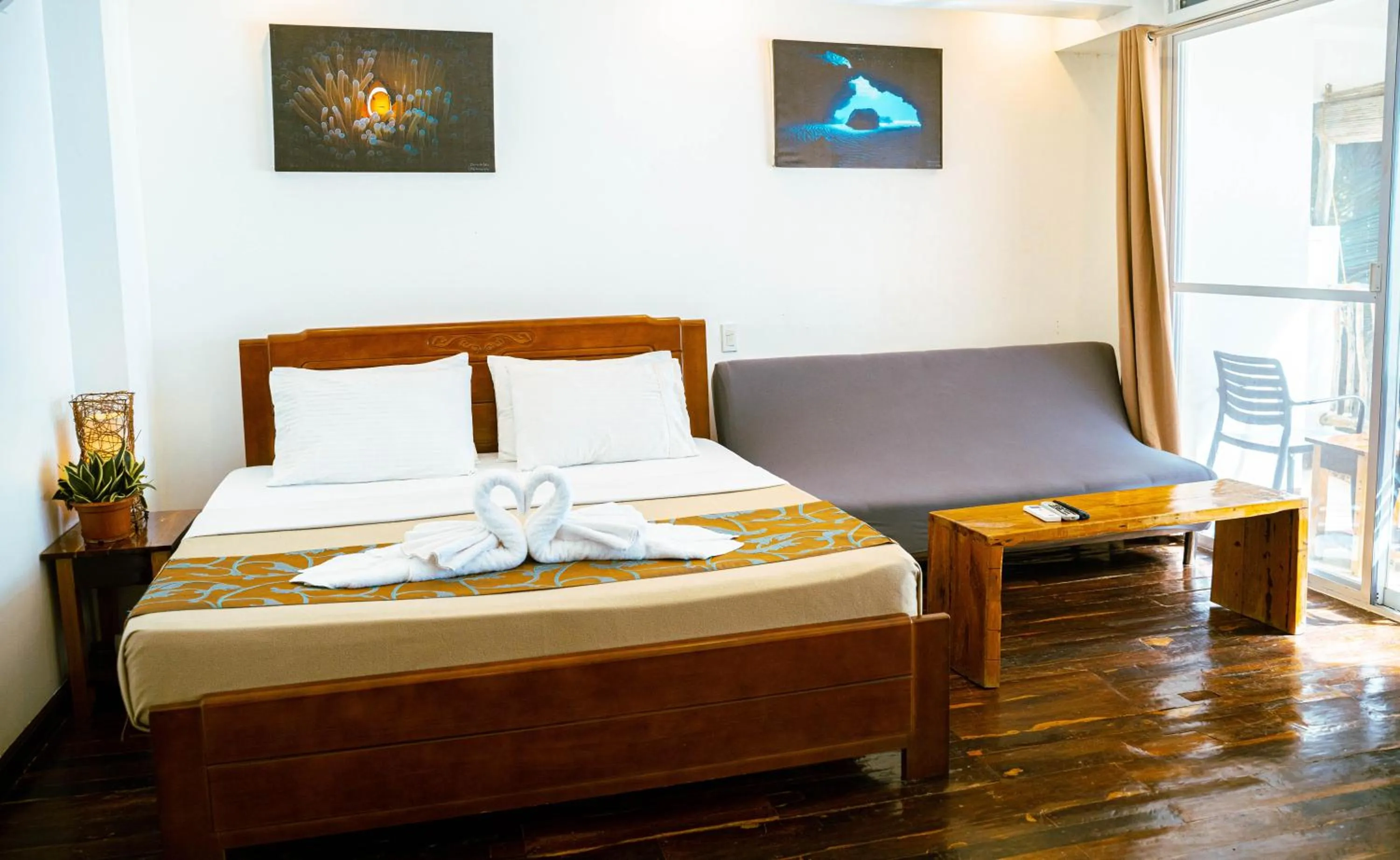 Bed in DiveGurus Boracay Beach Resort