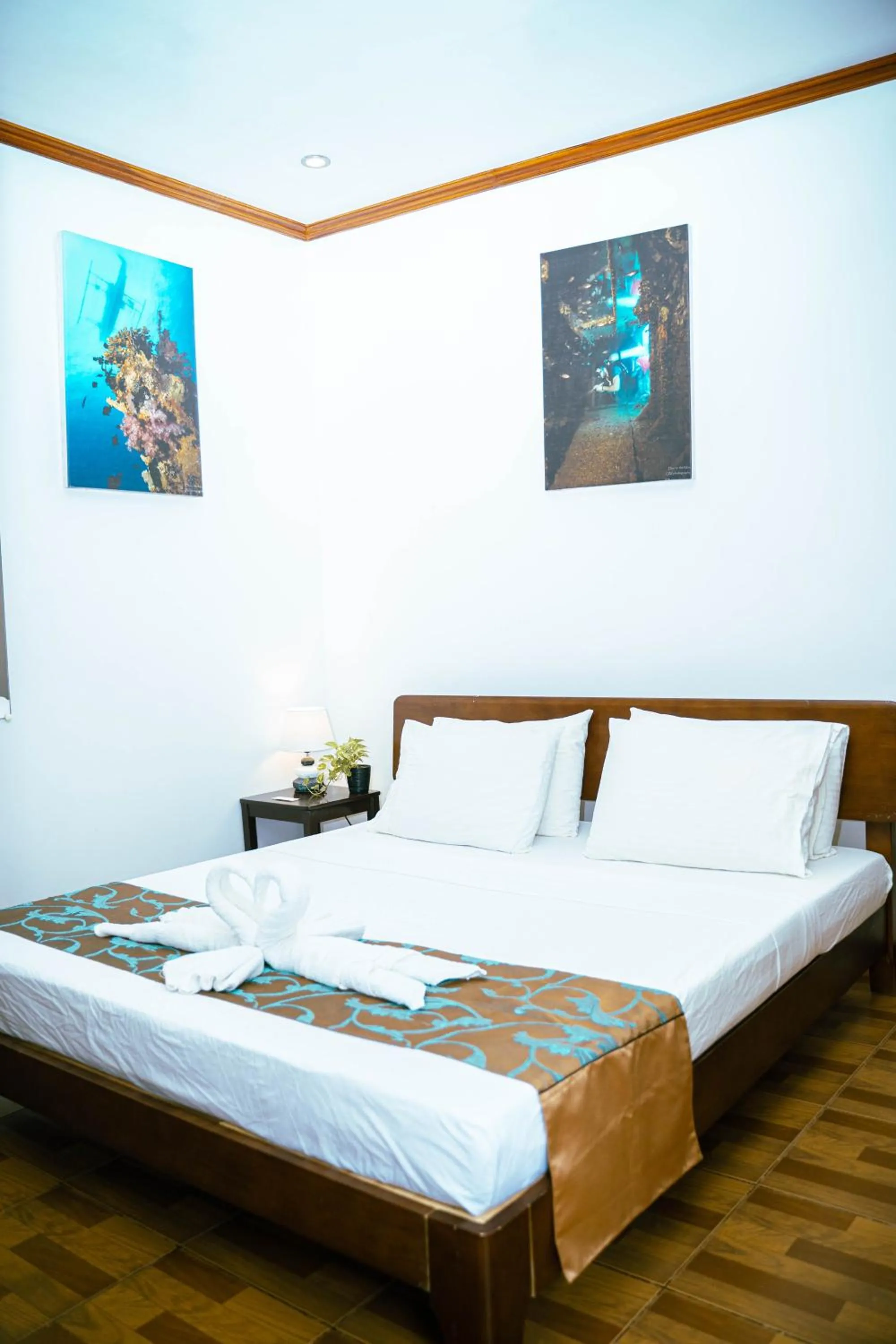 Bed in DiveGurus Boracay Beach Resort