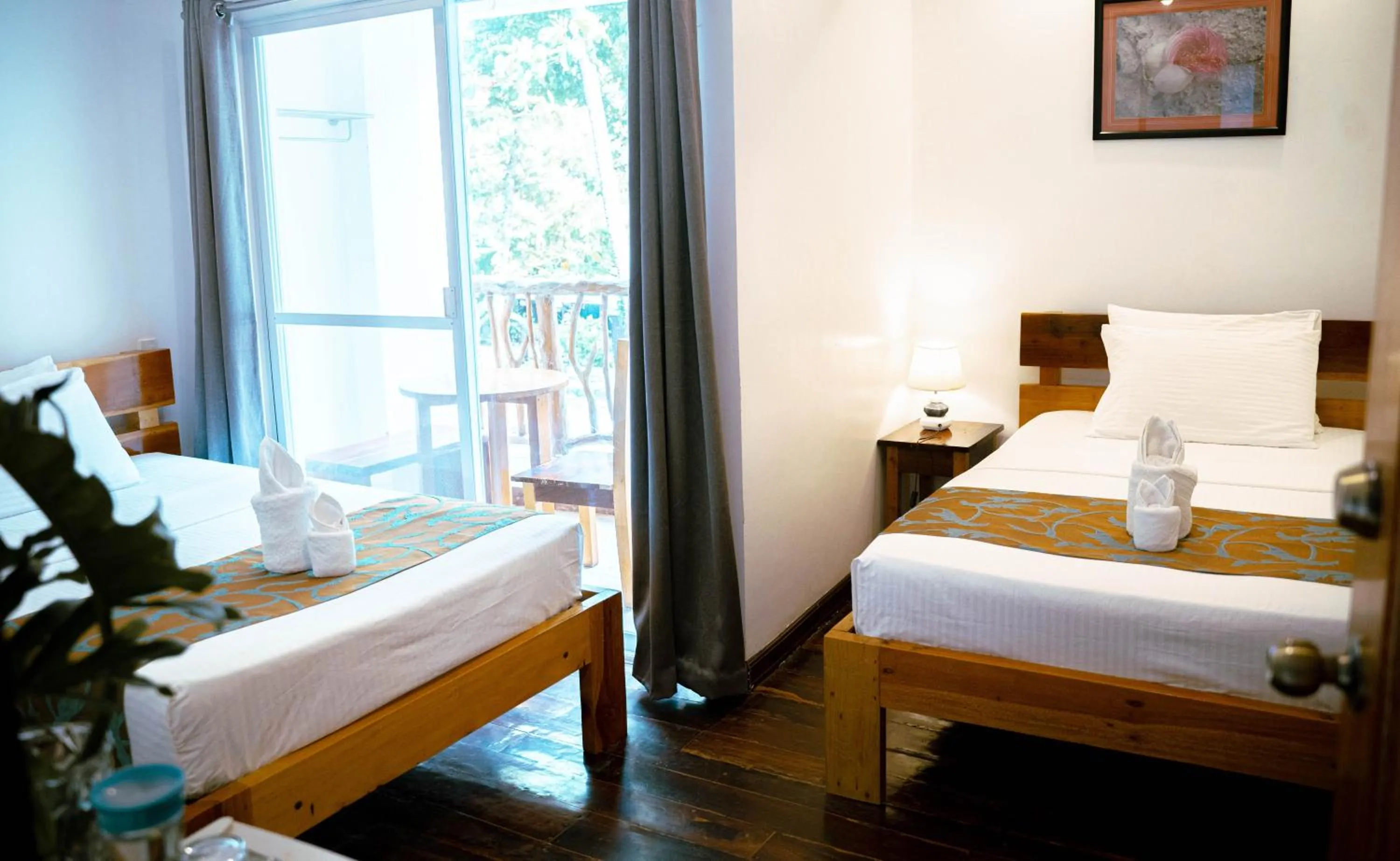 Bed in DiveGurus Boracay Beach Resort