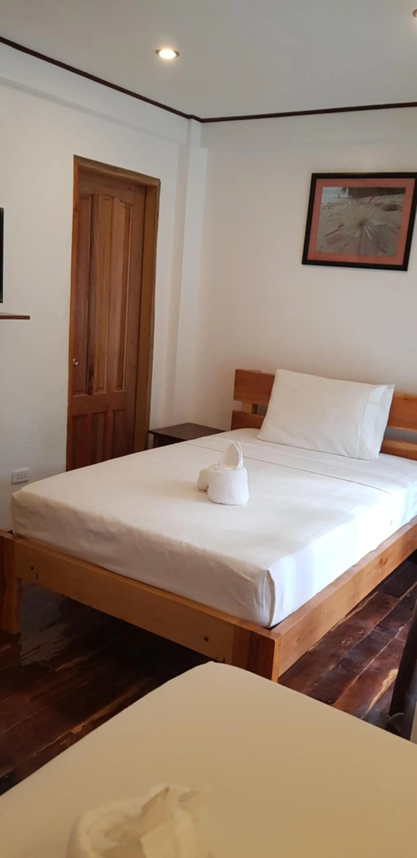 Bed in DiveGurus Boracay Beach Resort