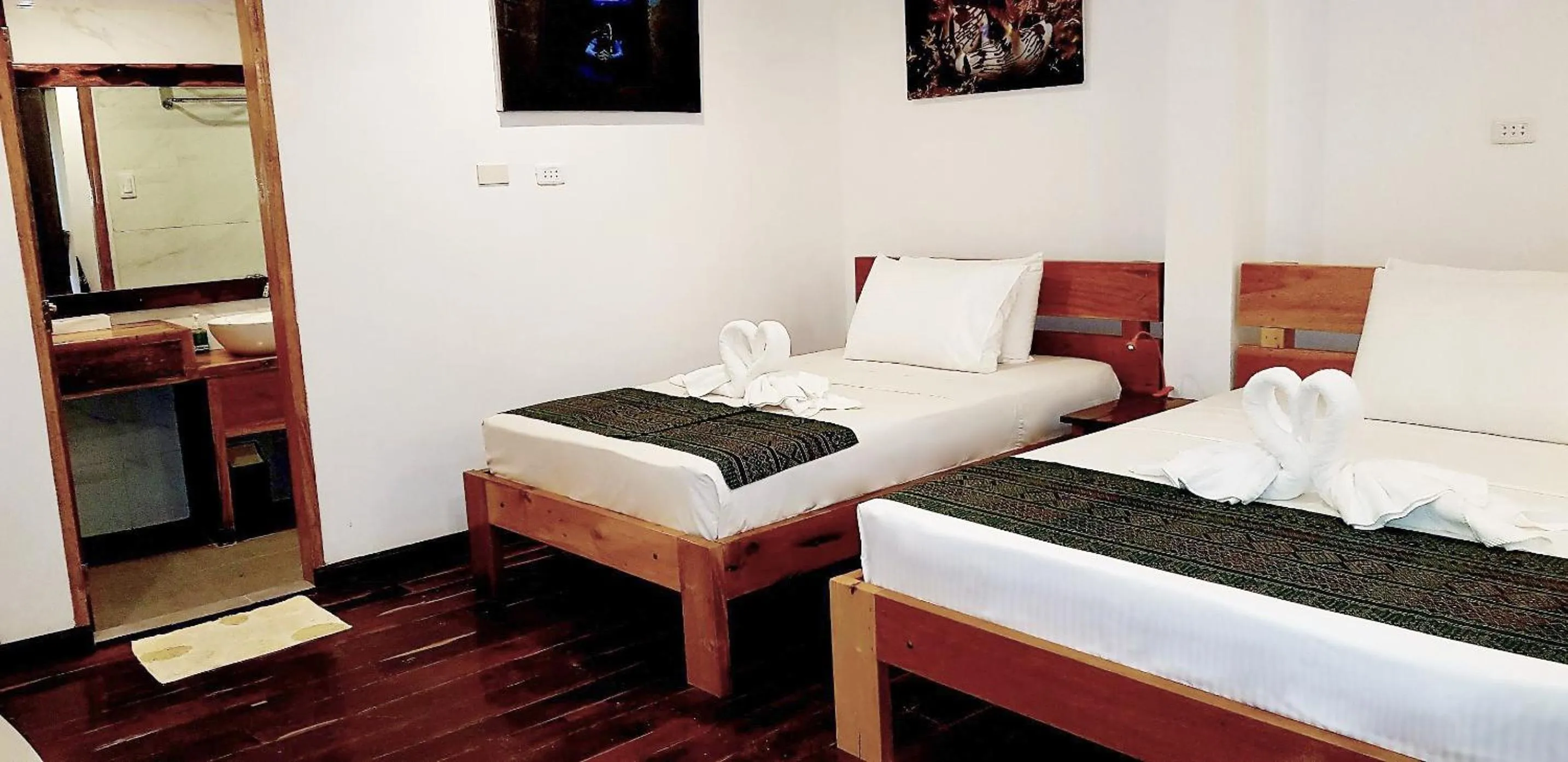 Bed in DiveGurus Boracay Beach Resort