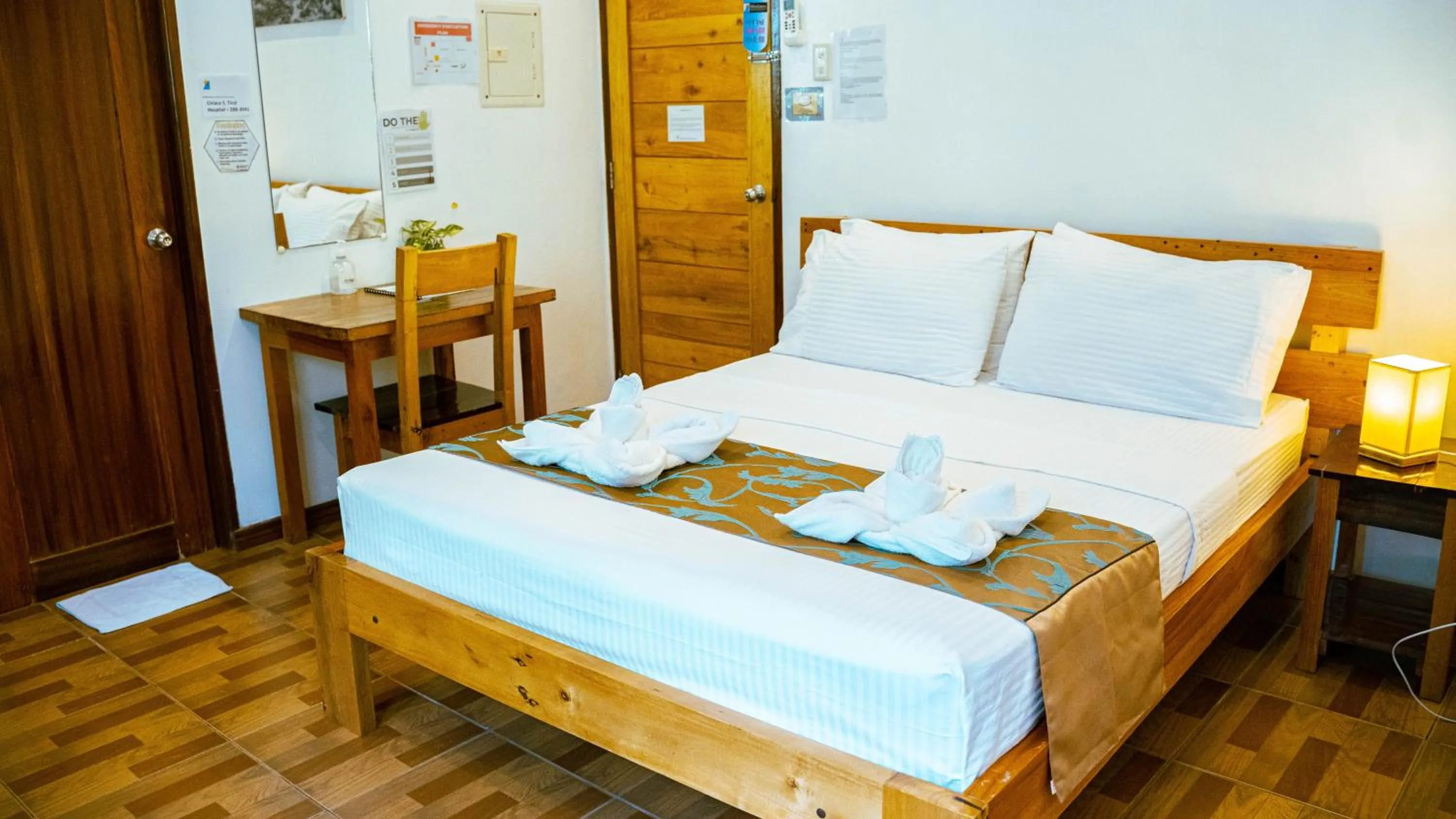 Bed in DiveGurus Boracay Beach Resort