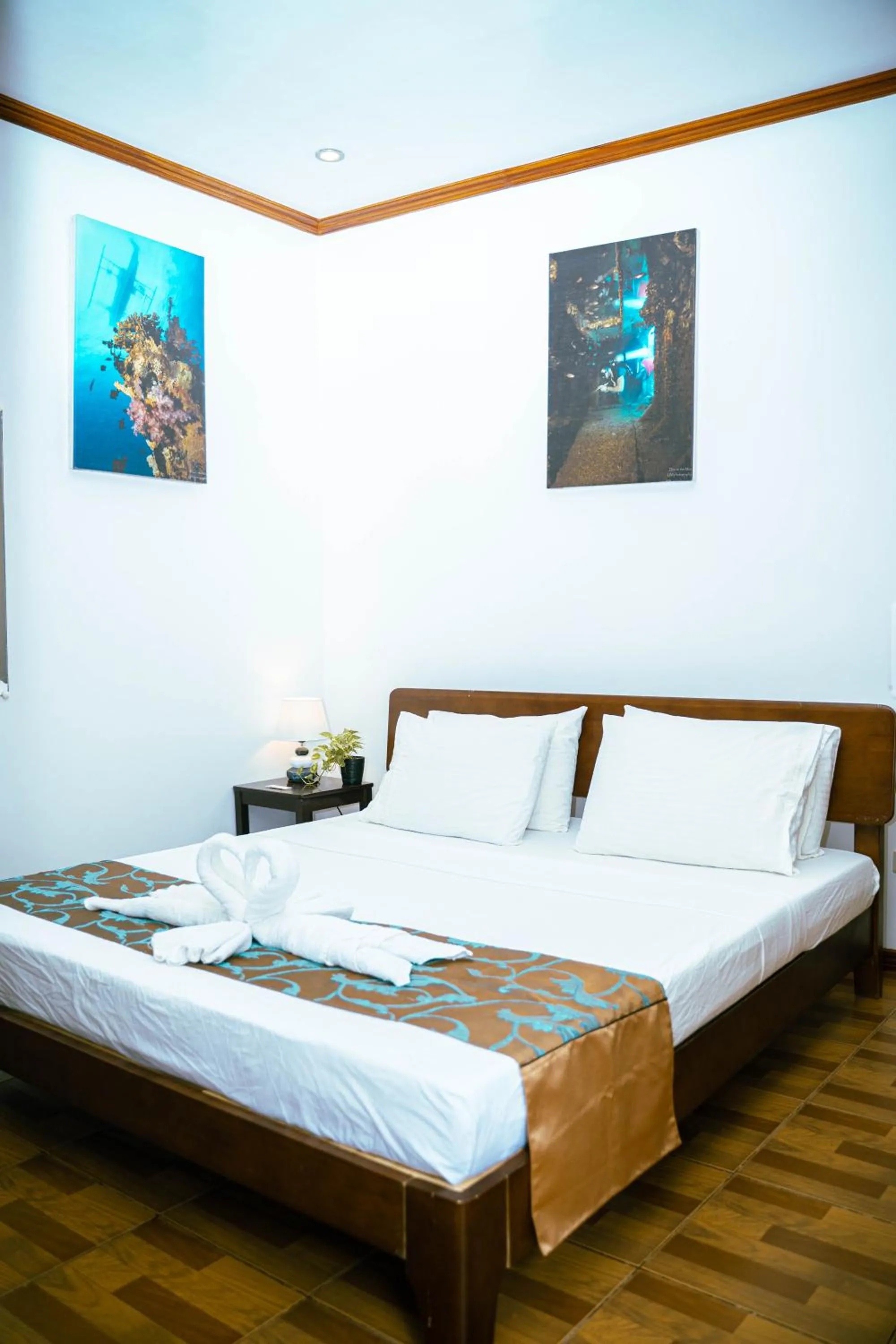 Bed in DiveGurus Boracay Beach Resort