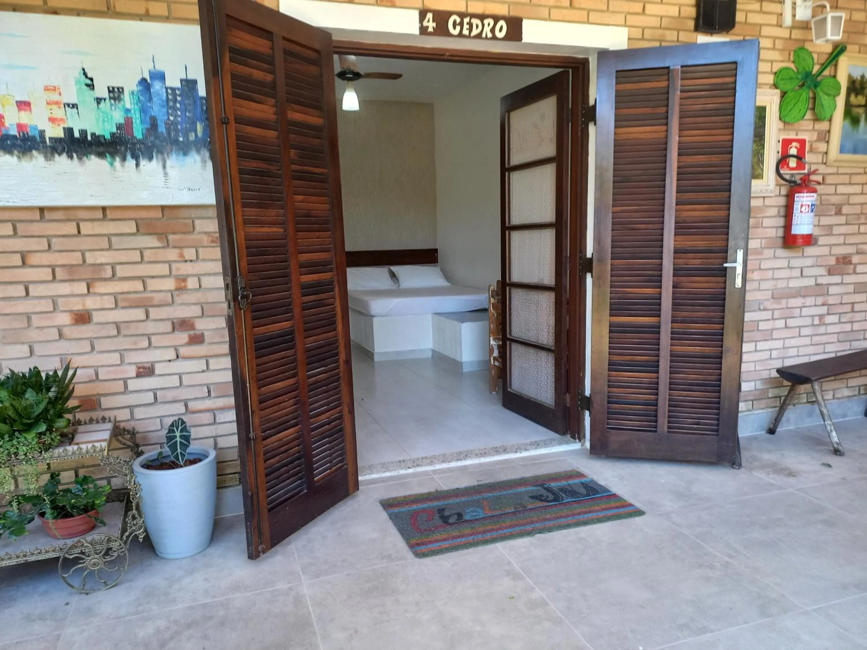 Bedroom in Chalé da Ju