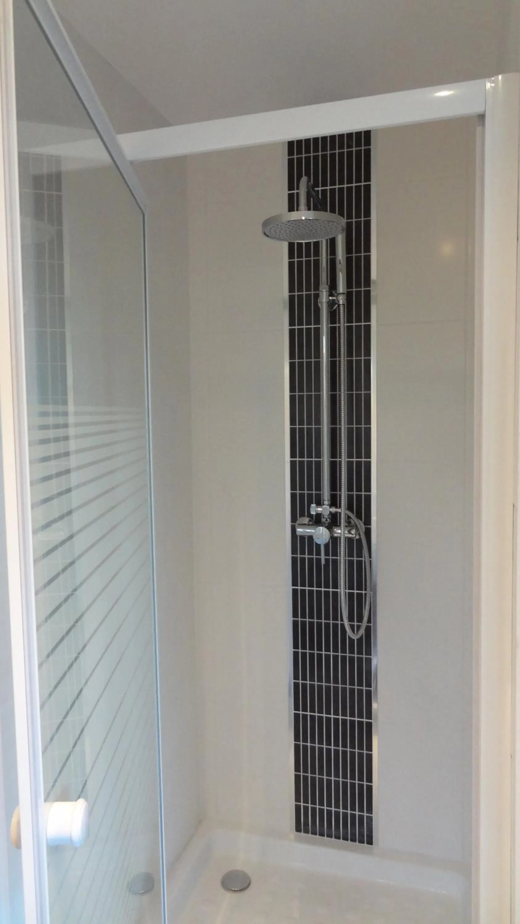 Shower in Chambre d'Hôtes du Clos Bamboo