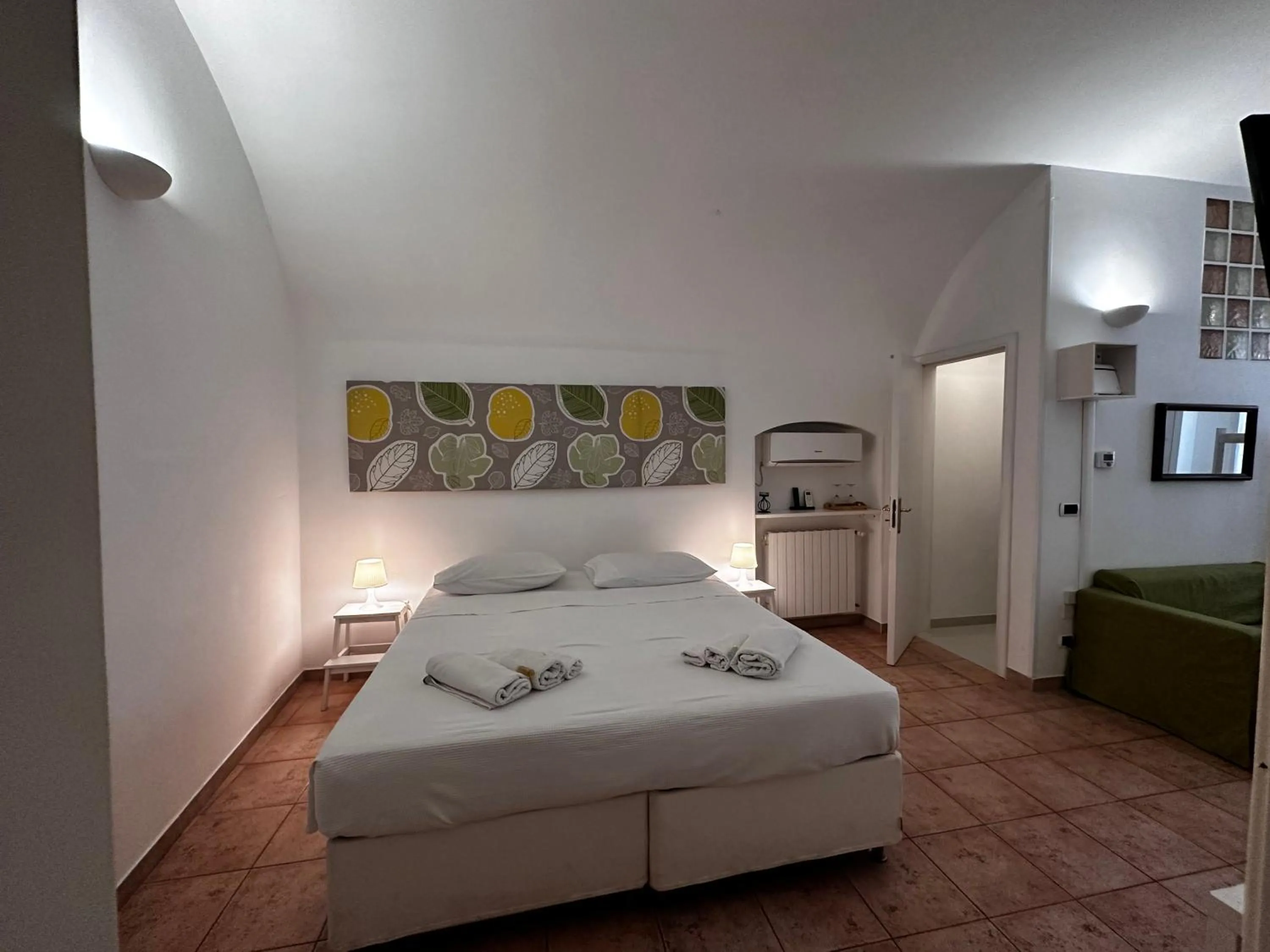 Bed in La Torre e il Mare Rooms by STHEY