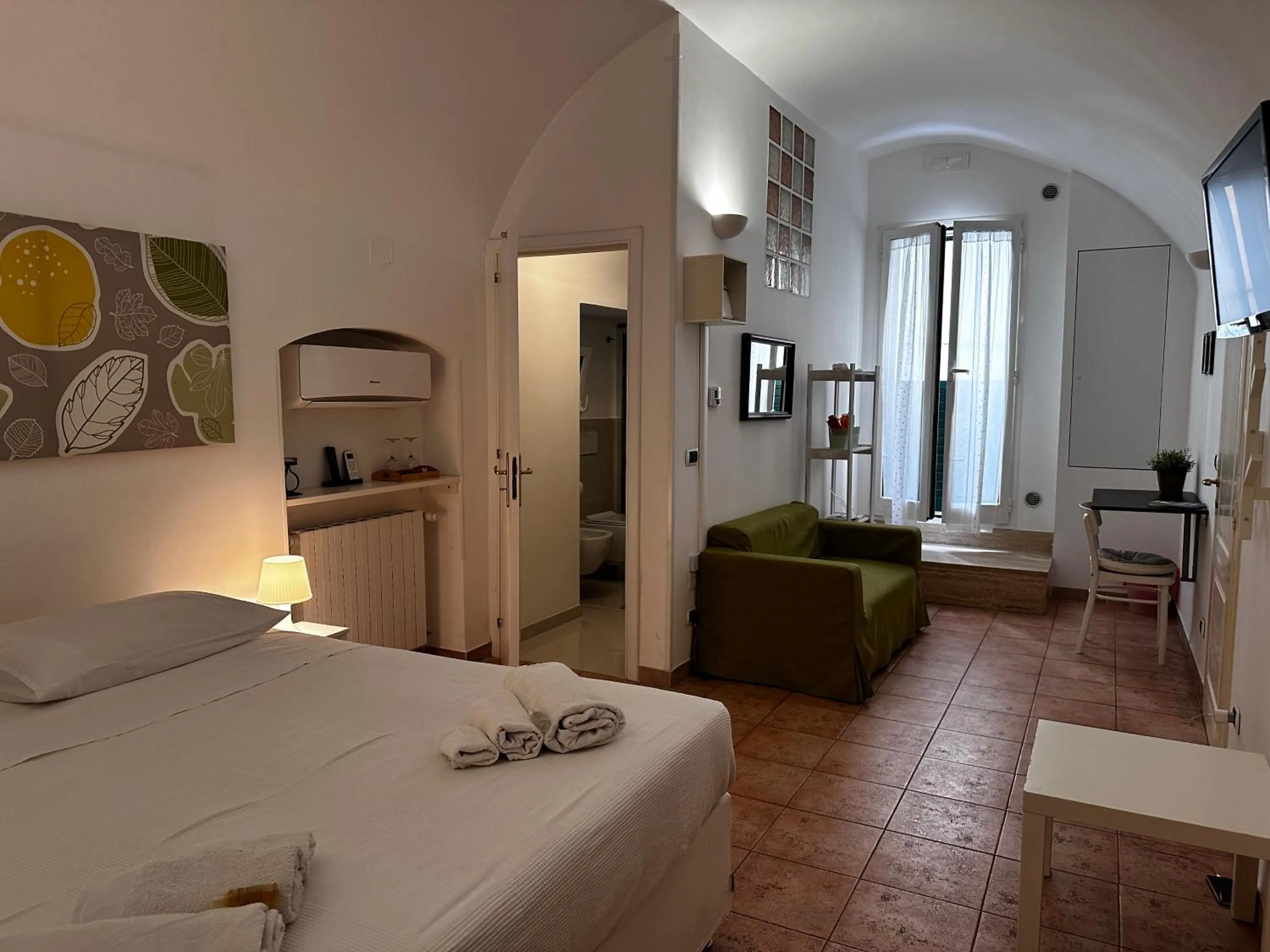 Photo of the whole room, Bed in La Torre e il Mare Rooms by STHEY