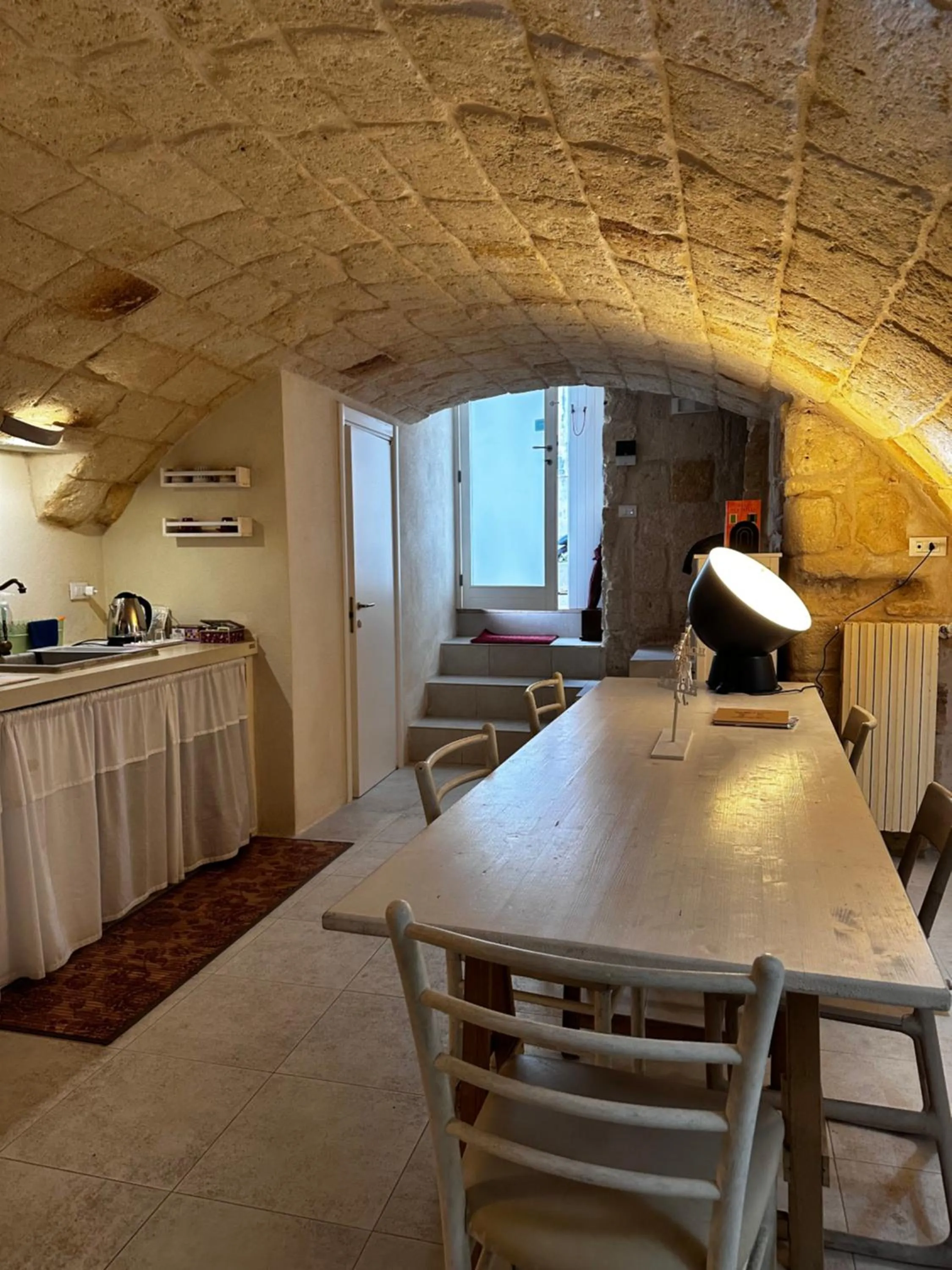 Kitchen or kitchenette in La Torre e il Mare Rooms by STHEY