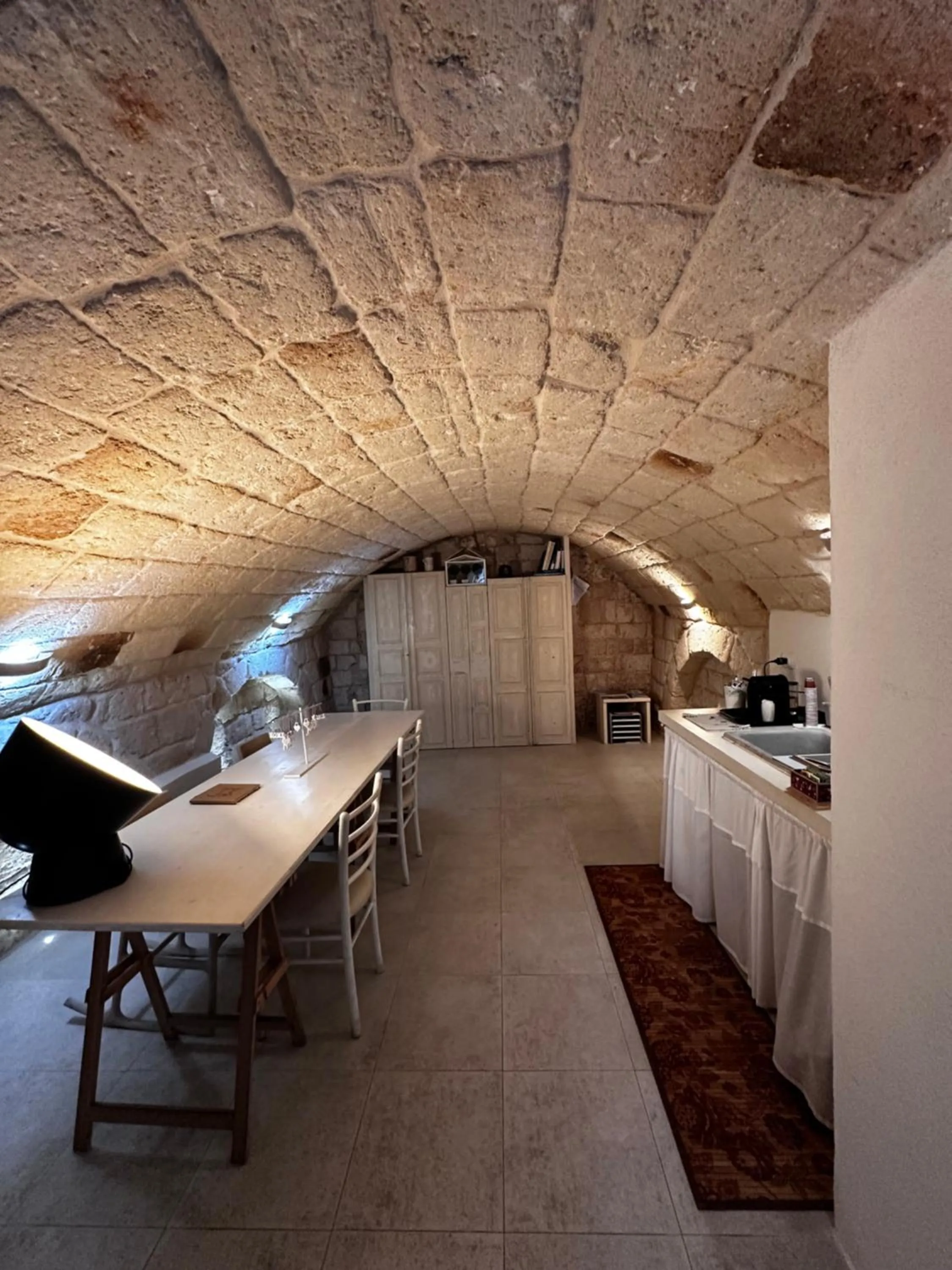 Kitchen or kitchenette in La Torre e il Mare Rooms by STHEY