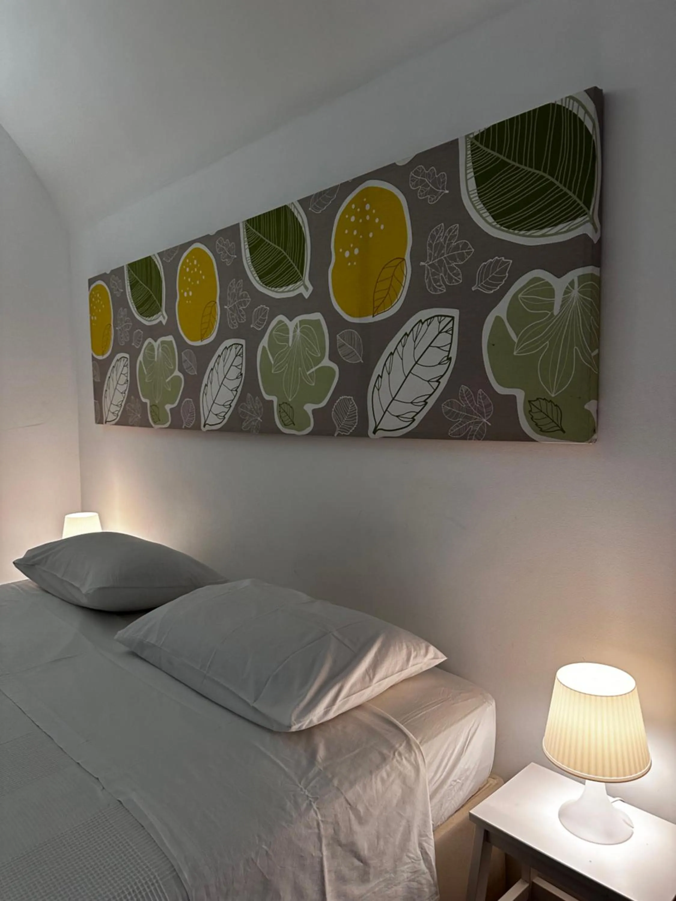 Bed in La Torre e il Mare Rooms by STHEY