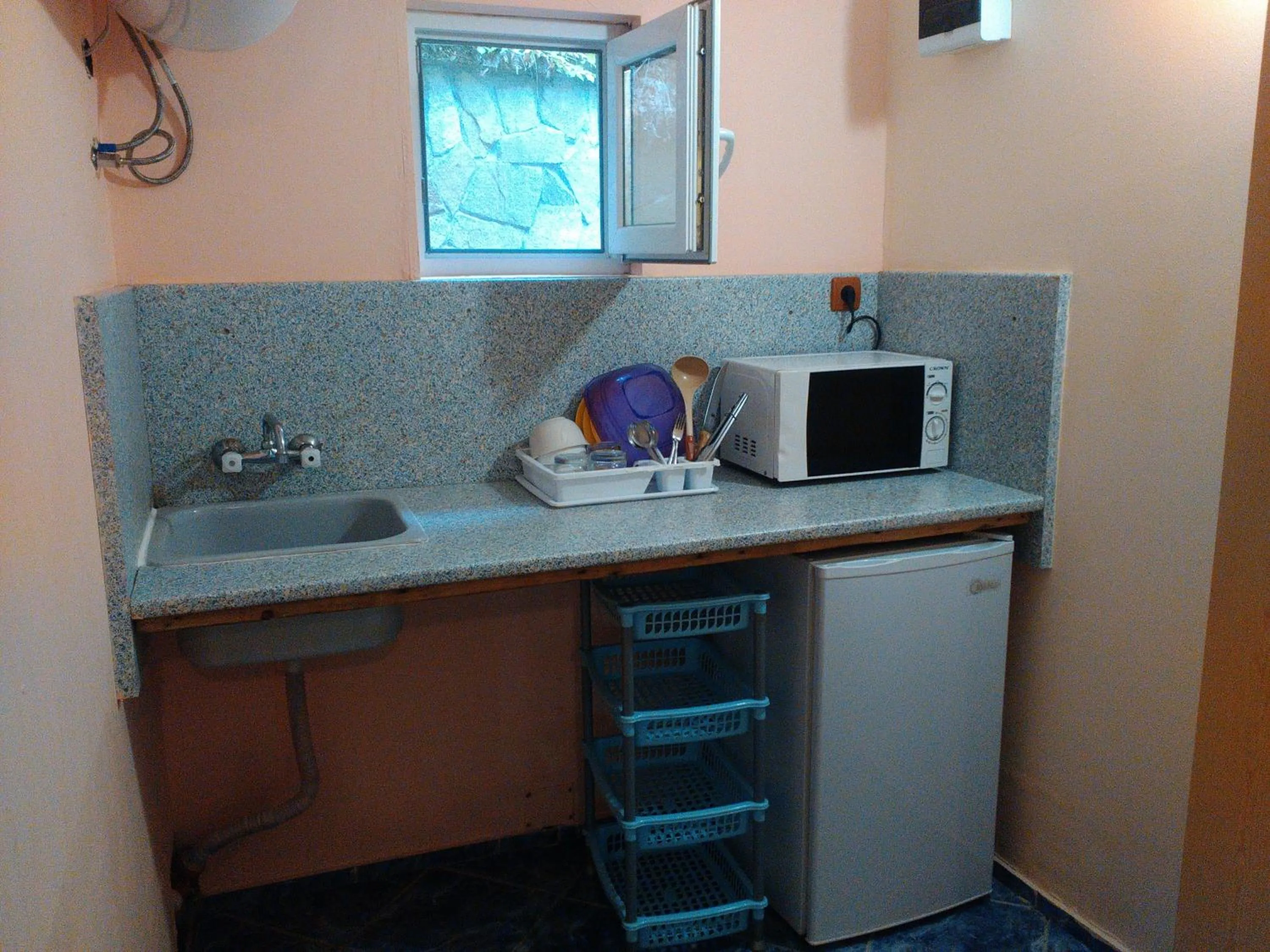 Kitchen or kitchenette in Nimpha Bungalows