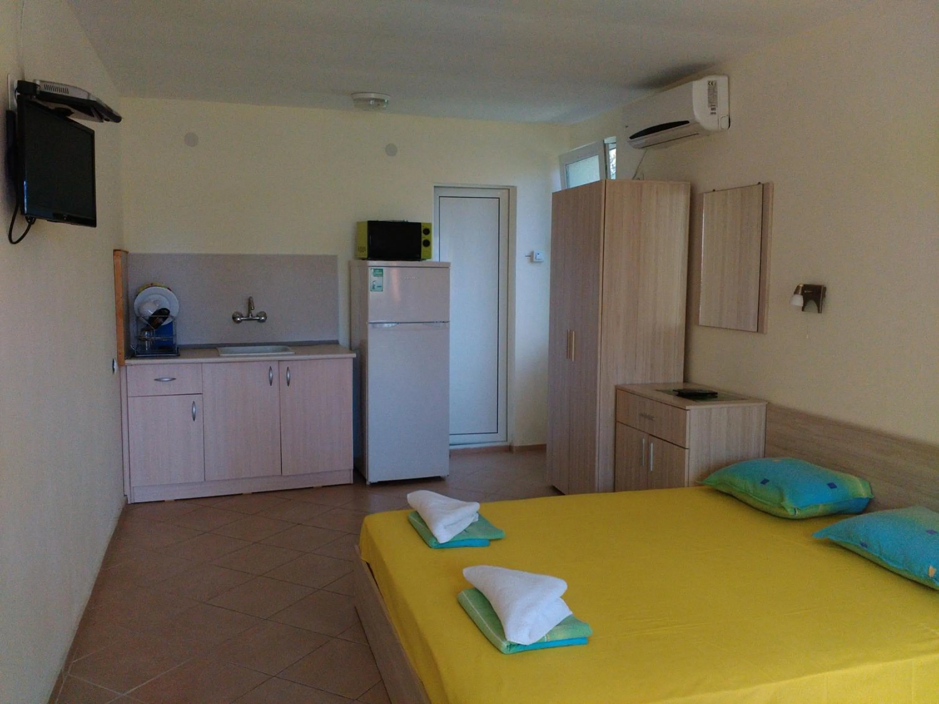 Kitchen or kitchenette in Nimpha Bungalows