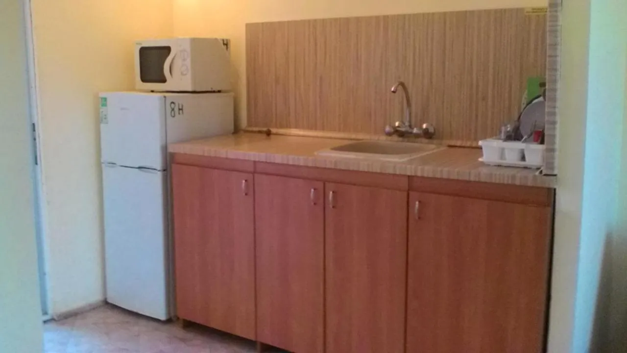 Kitchen or kitchenette in Nimpha Bungalows