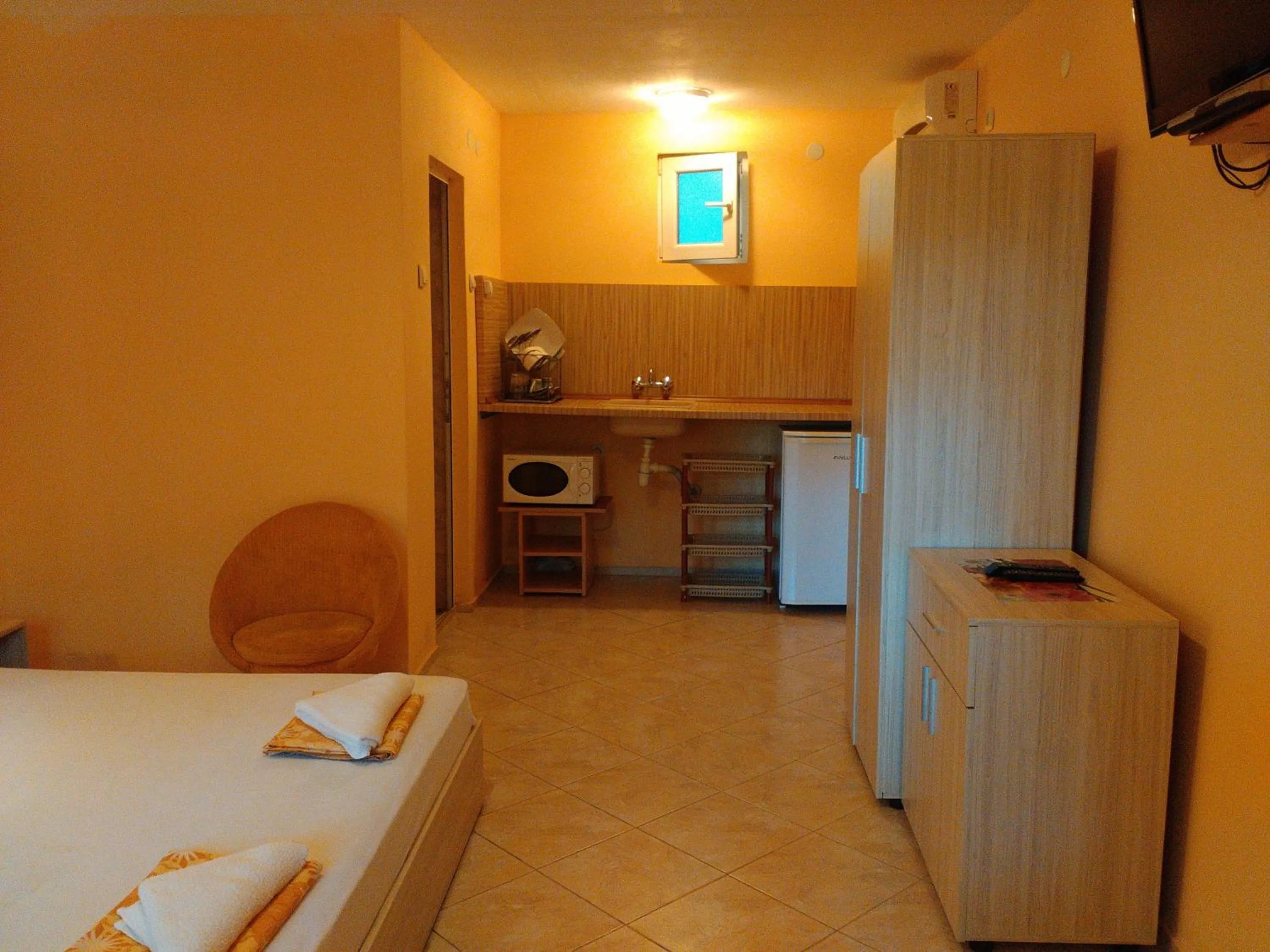 Kitchen or kitchenette in Nimpha Bungalows