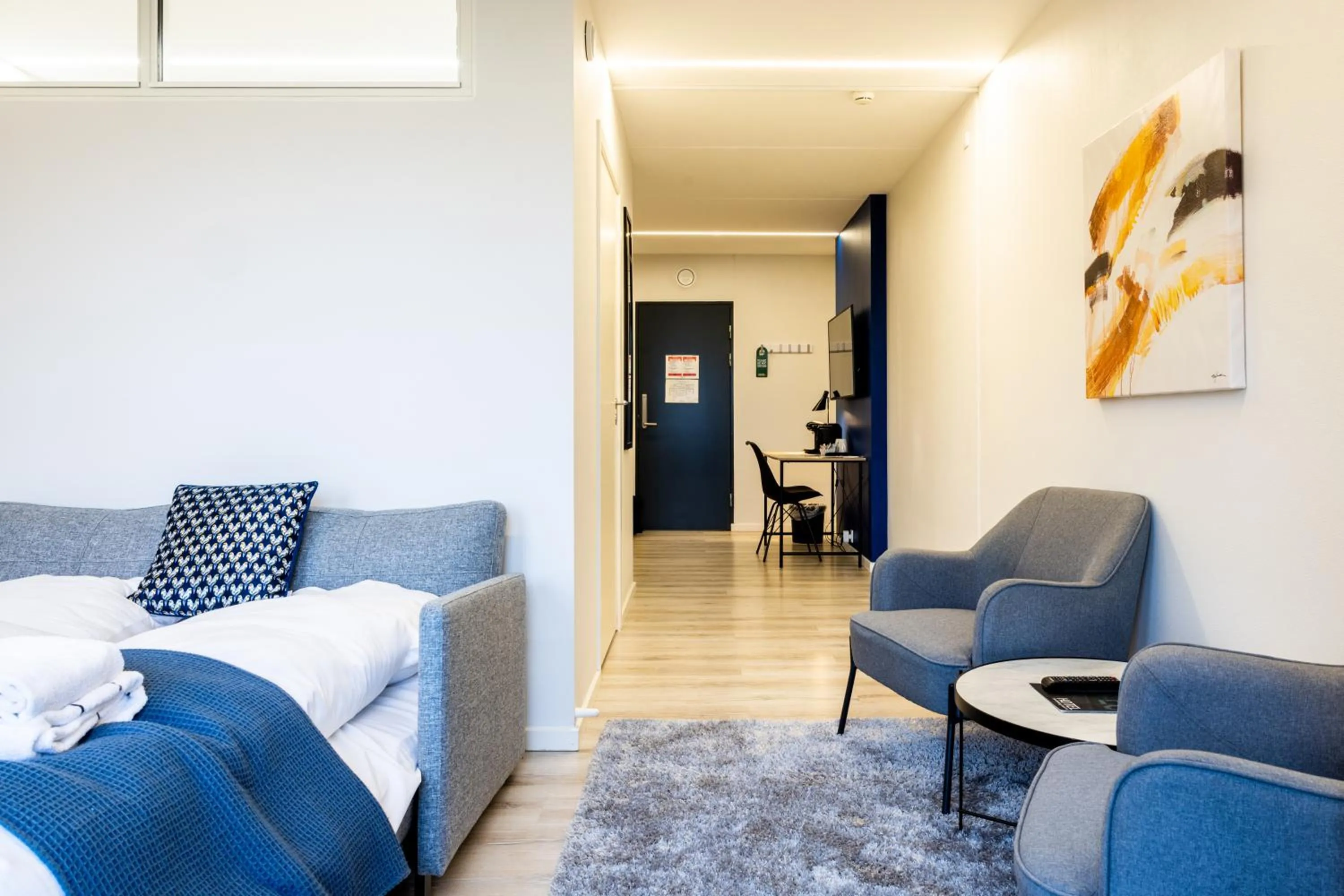 Living room, Bed in Hotel Sønderborg Kaserne