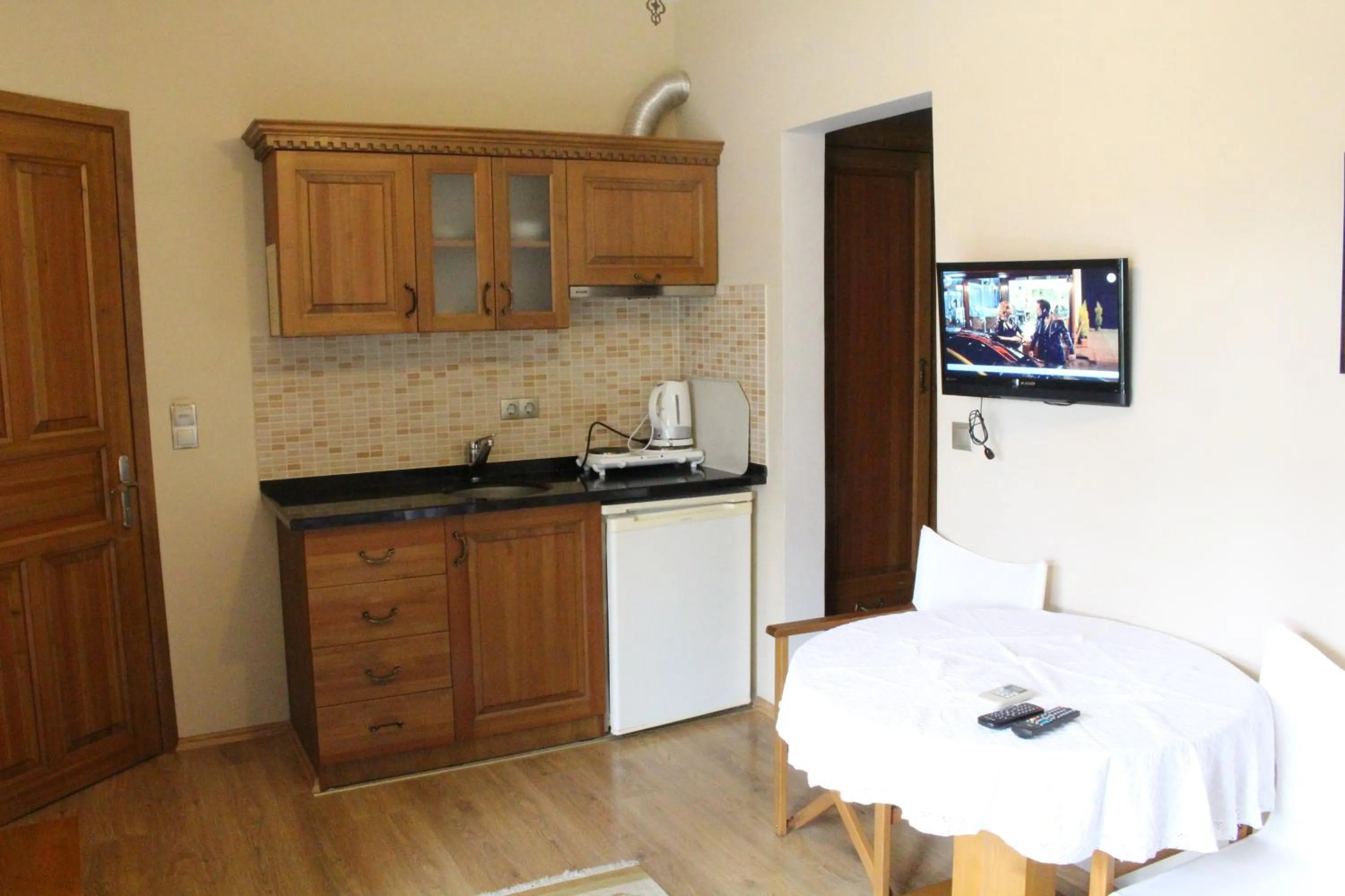 Kitchen or kitchenette in Nirvana Hotel