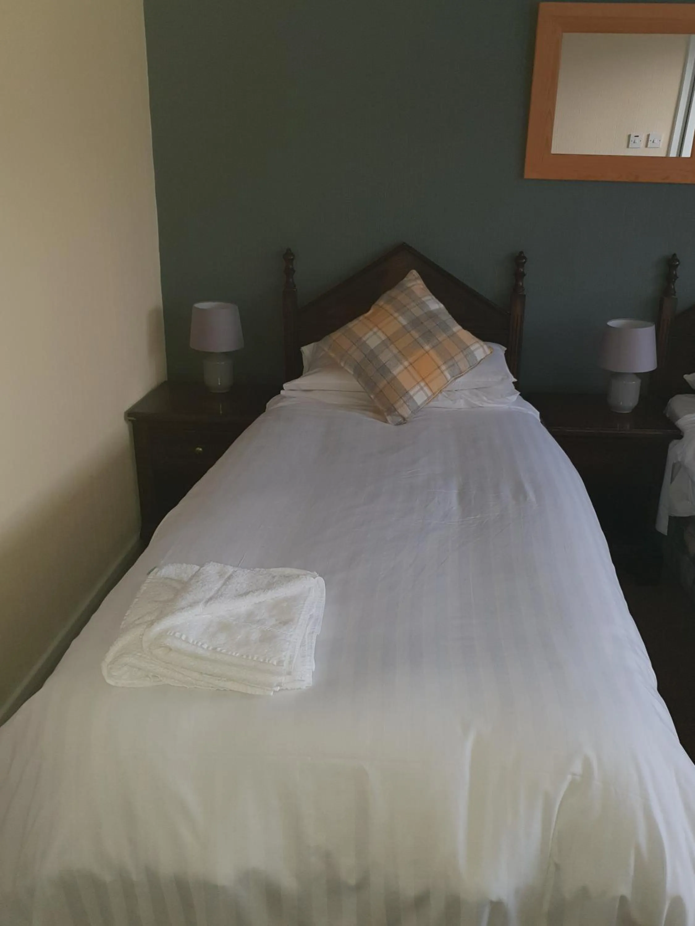 Bed in Queensberry Arms Hotel