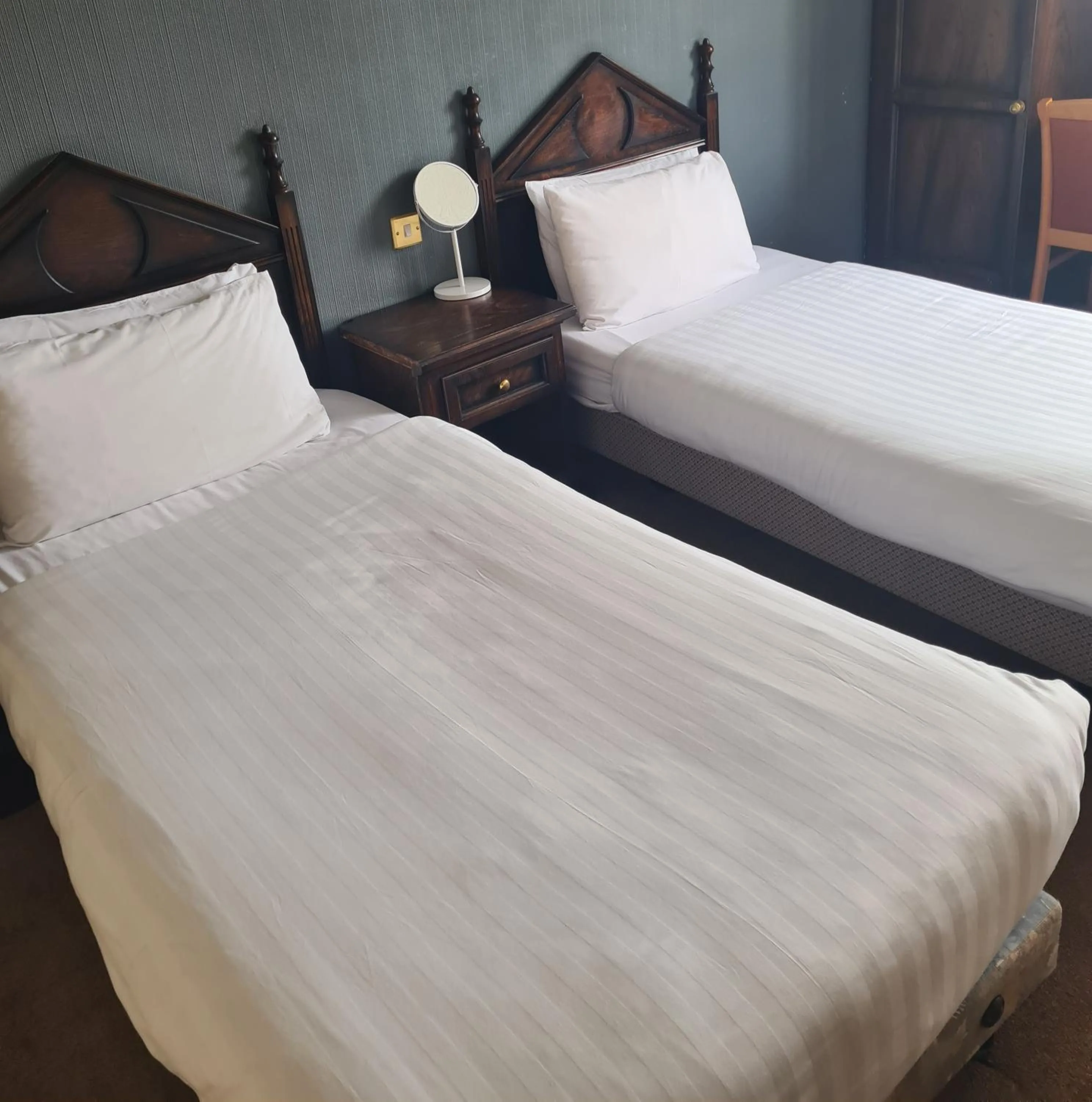 Bed in Queensberry Arms Hotel