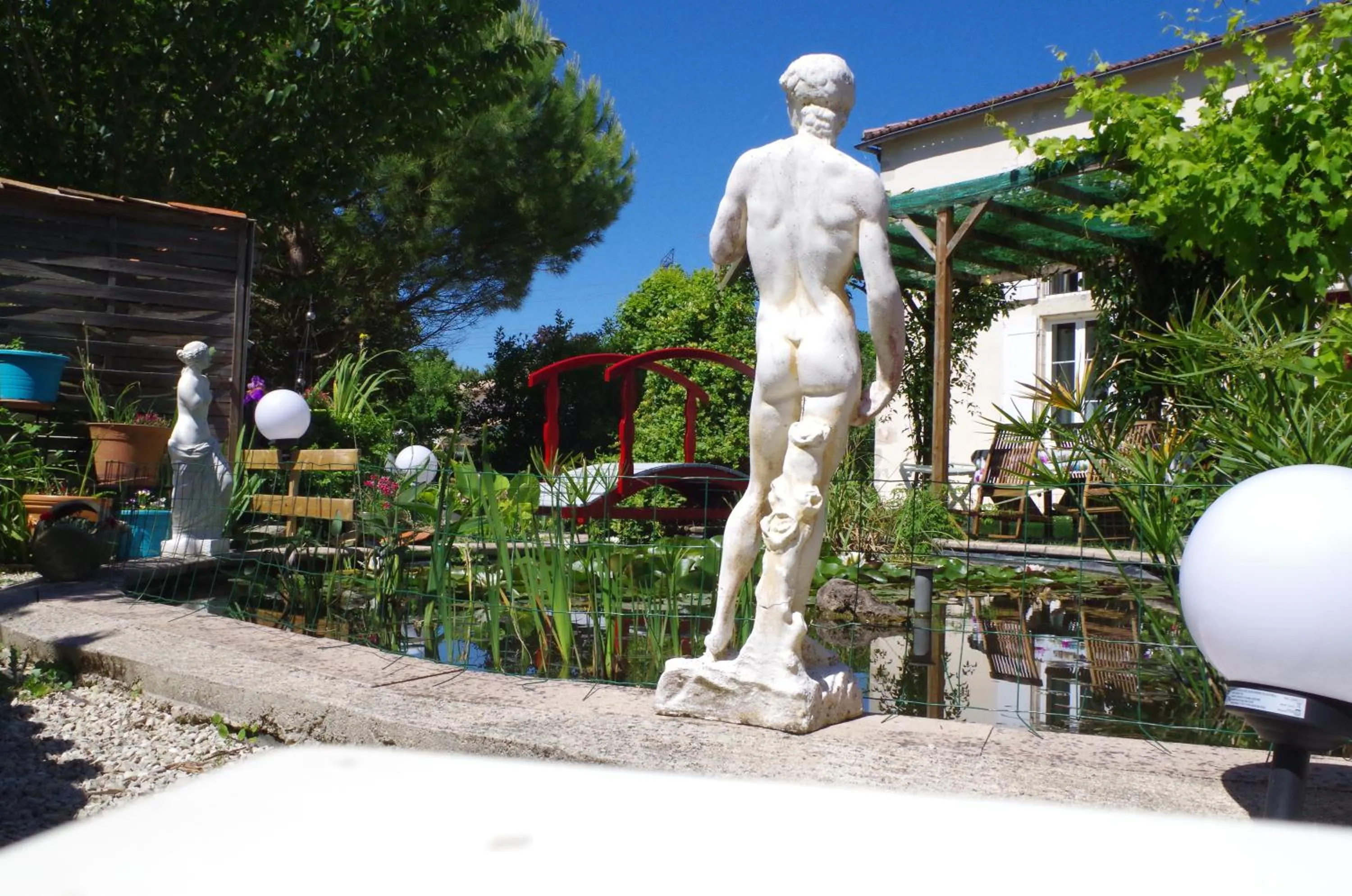 Garden in Maison d'Hôtes Le Cadran Solaire