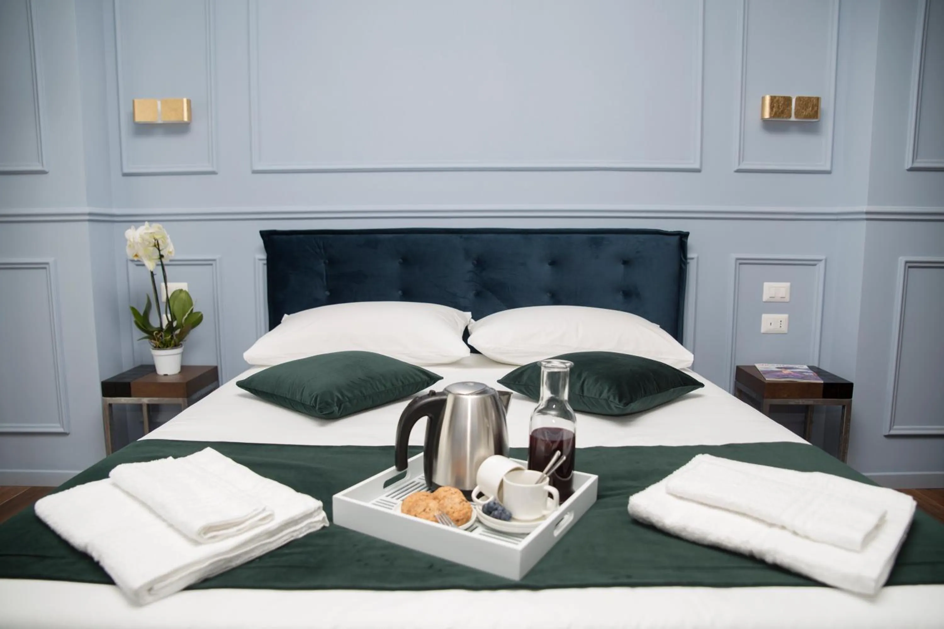 Bed in Unicum Roma Suites