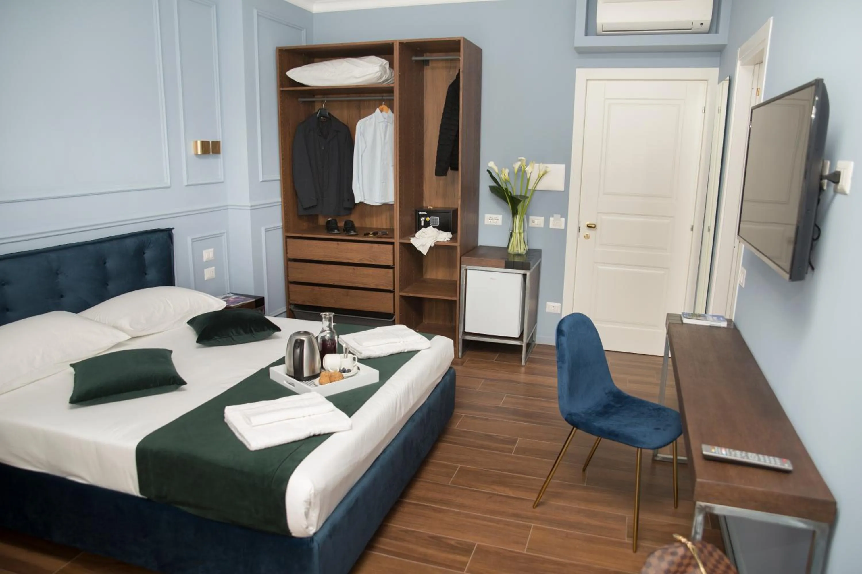 Bed in Unicum Roma Suites