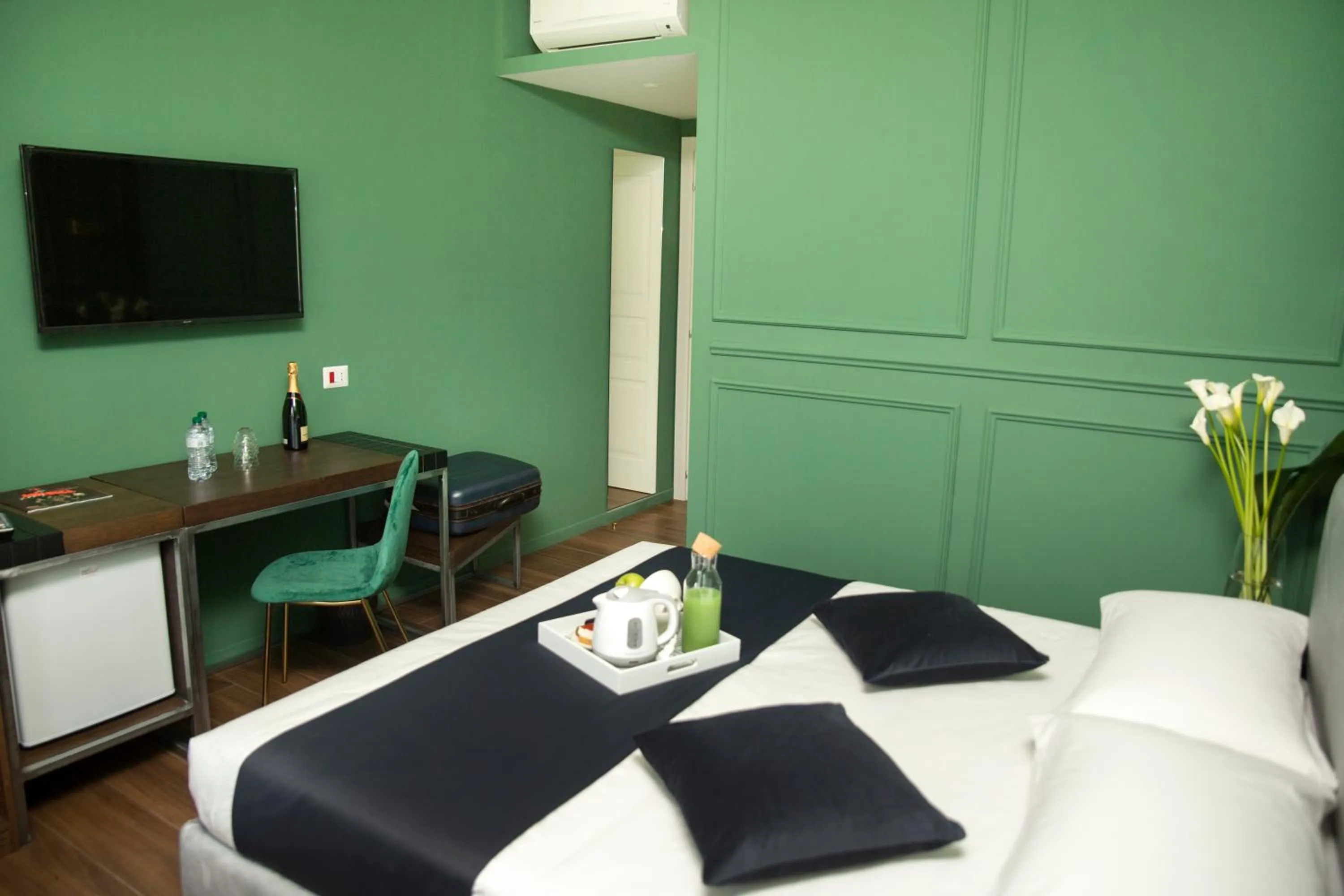 Bed in Unicum Roma Suites