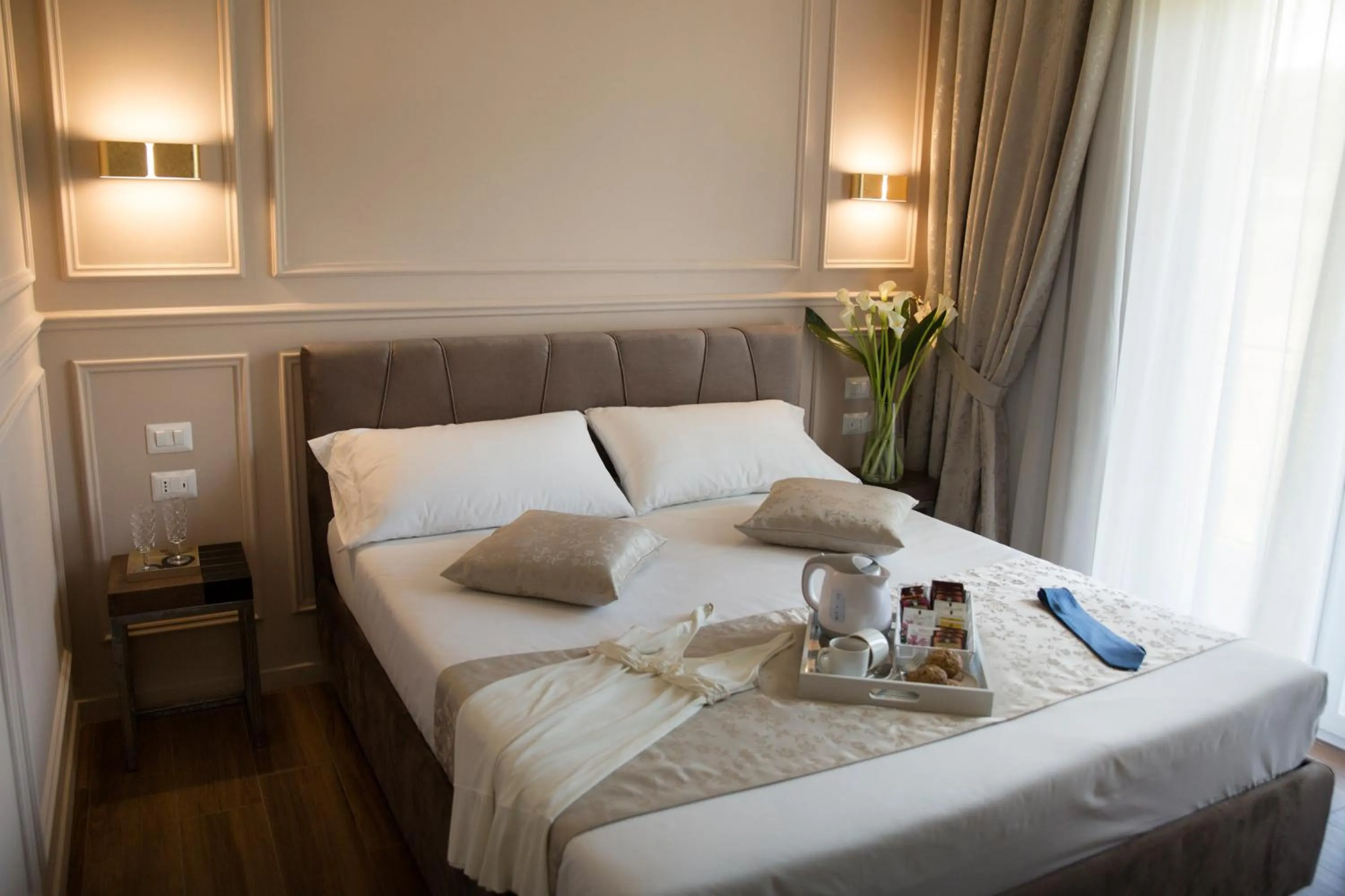 Bed in Unicum Roma Suites