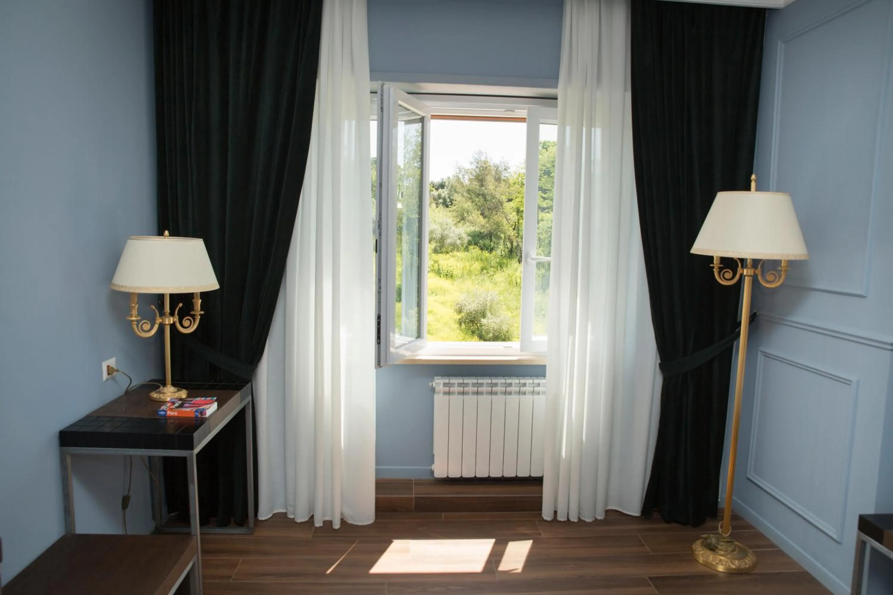 Garden view in Unicum Roma Suites