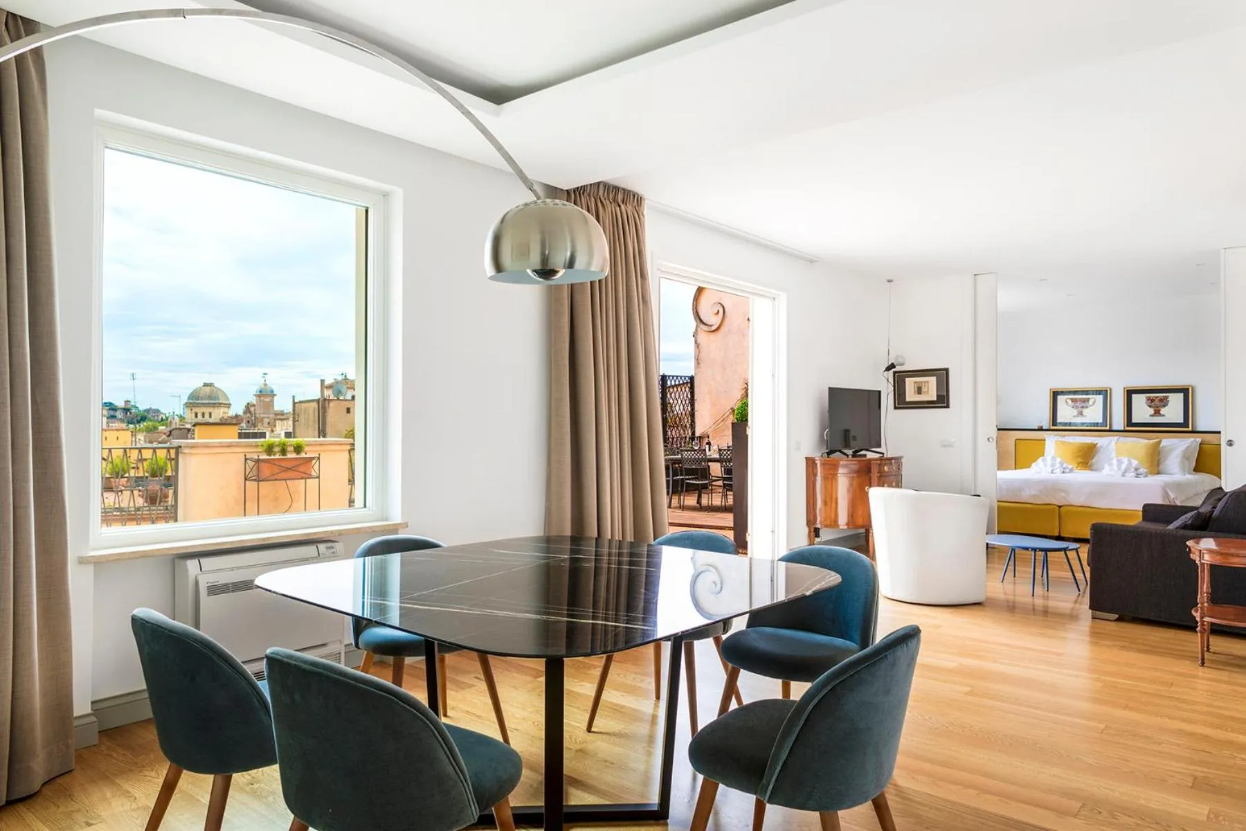 Dining area in Penthouse Rome Capitol