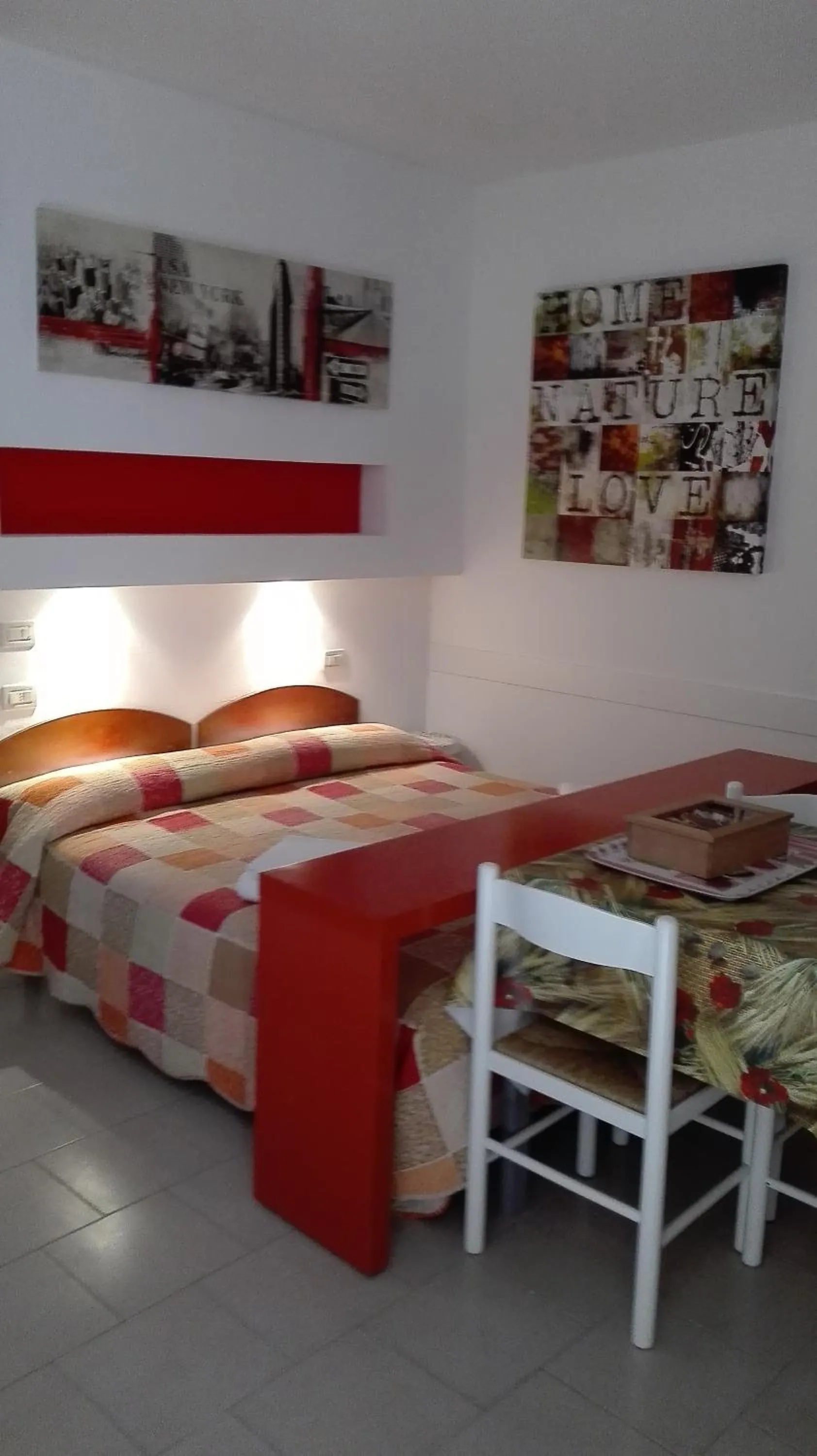 Living room, Bed in Residence La Madonnina