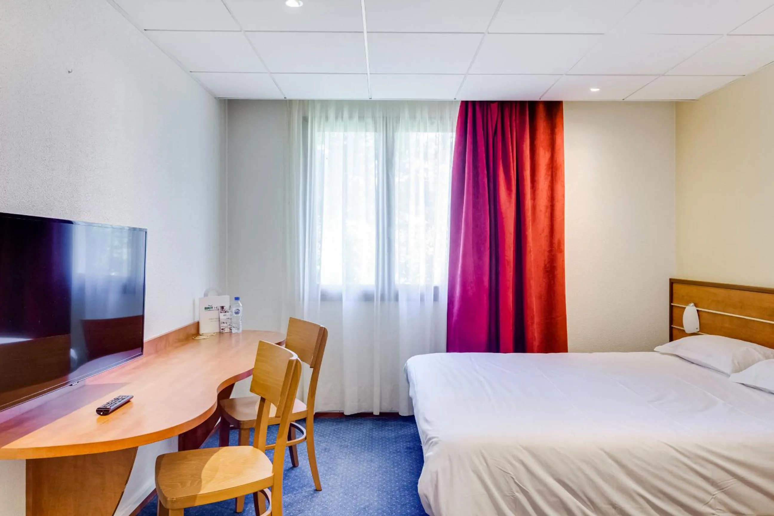 Photo of the whole room, Bed in Brit Hotel Nantes Vigneux - L'Atlantel