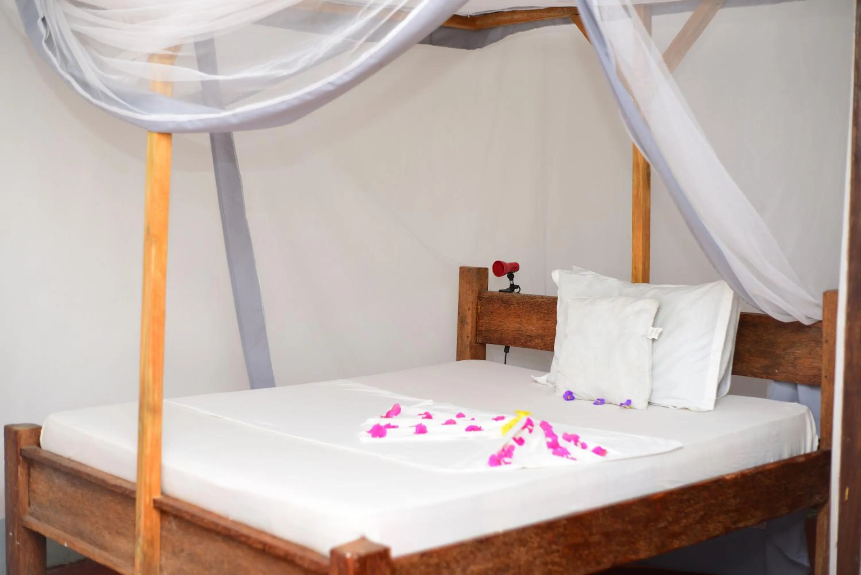 Bed in Furaha Lodge