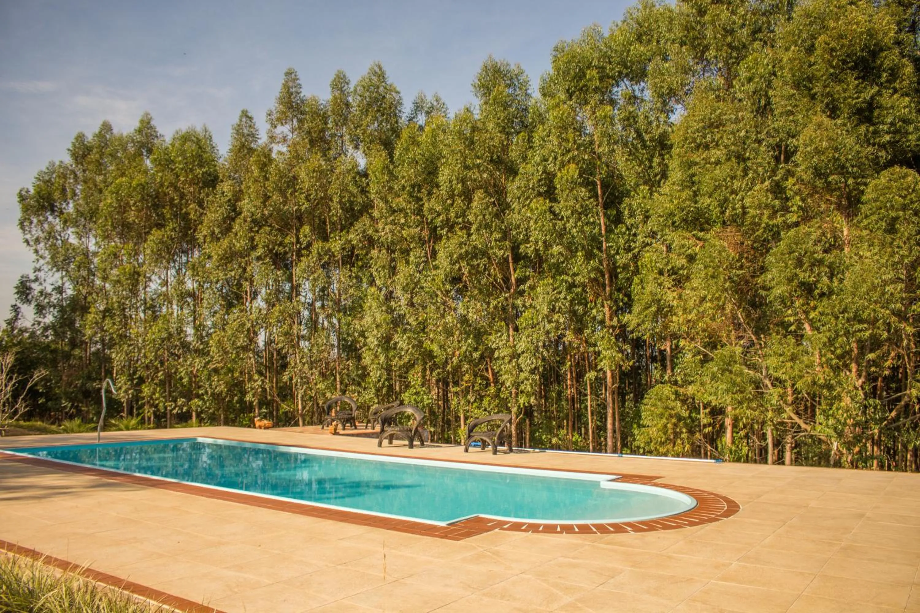 Swimming pool in Verdes Em Cantos Pousada