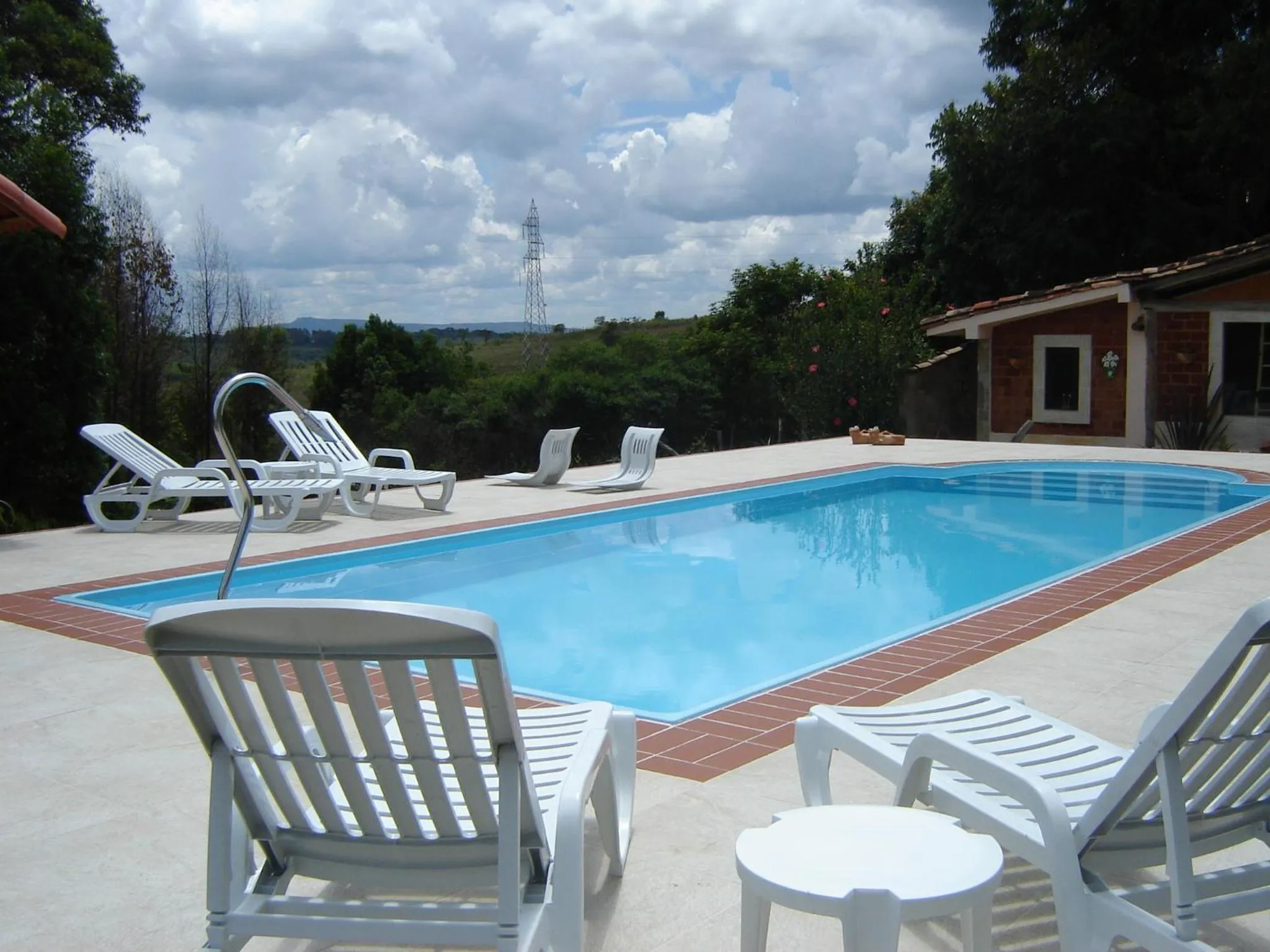 Swimming pool in Verdes Em Cantos Pousada