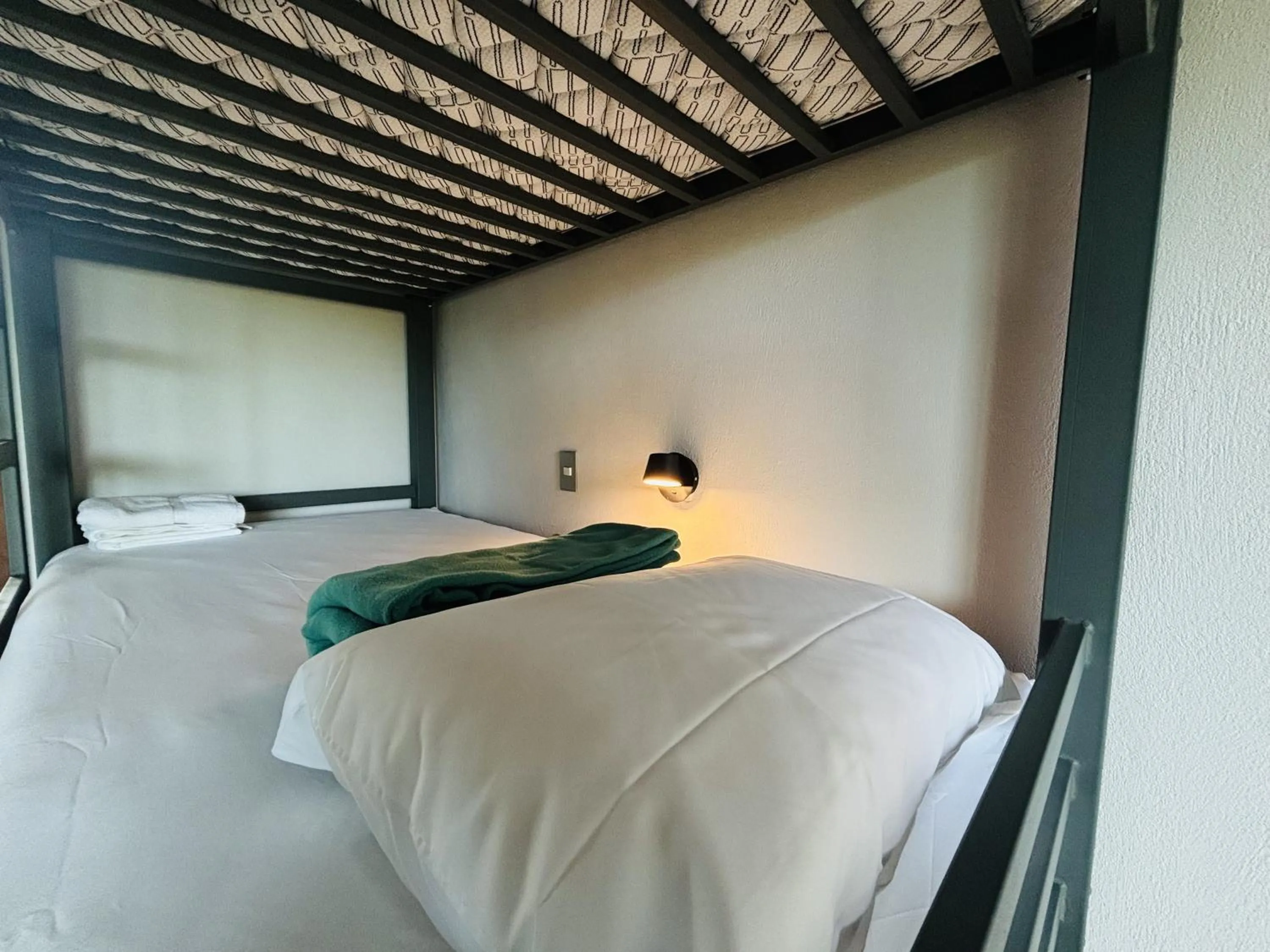 Bed in Arenal Backpackers Resort