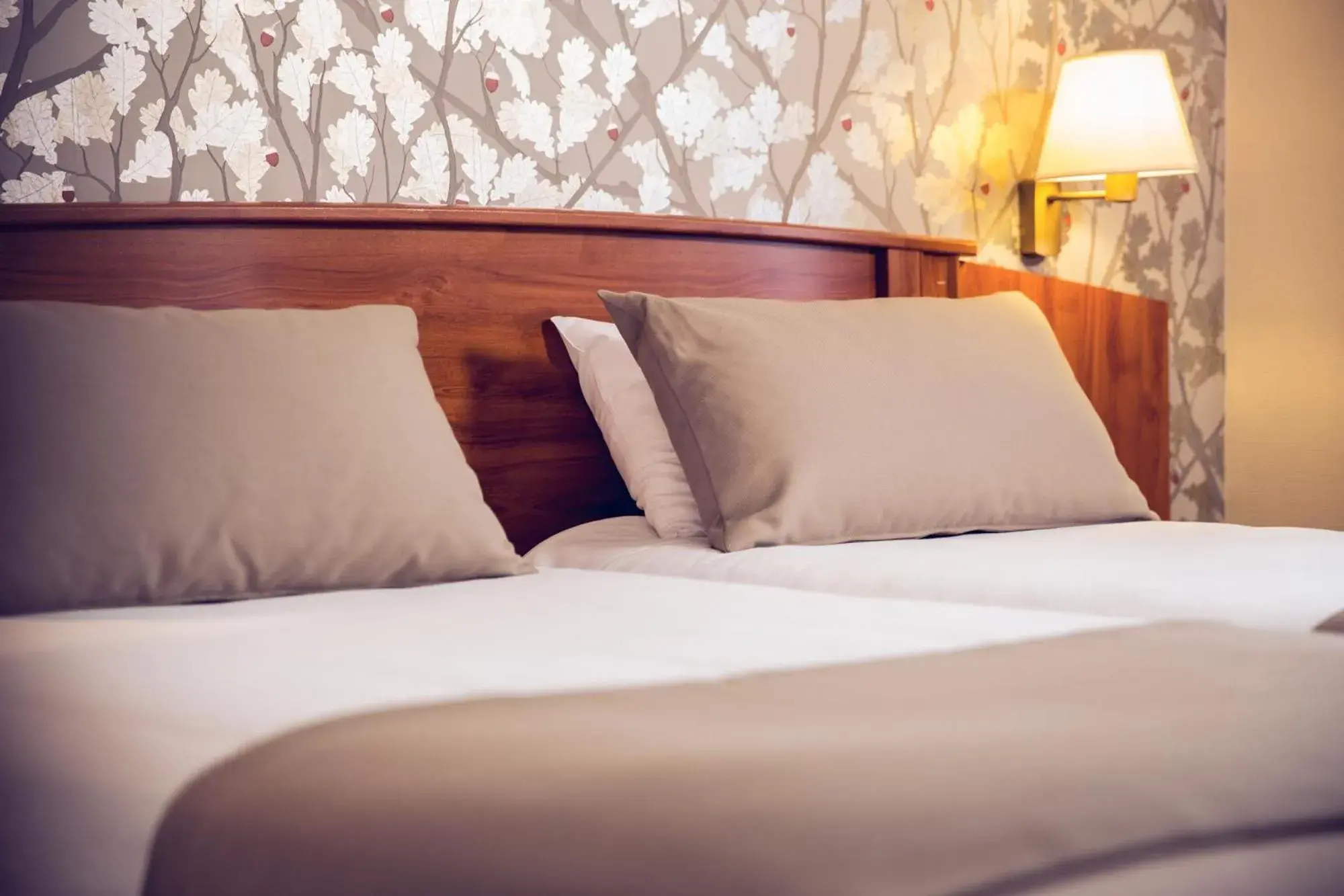 Bed in Timhotel Le Louvre Bed in Timhotel Le Louvre