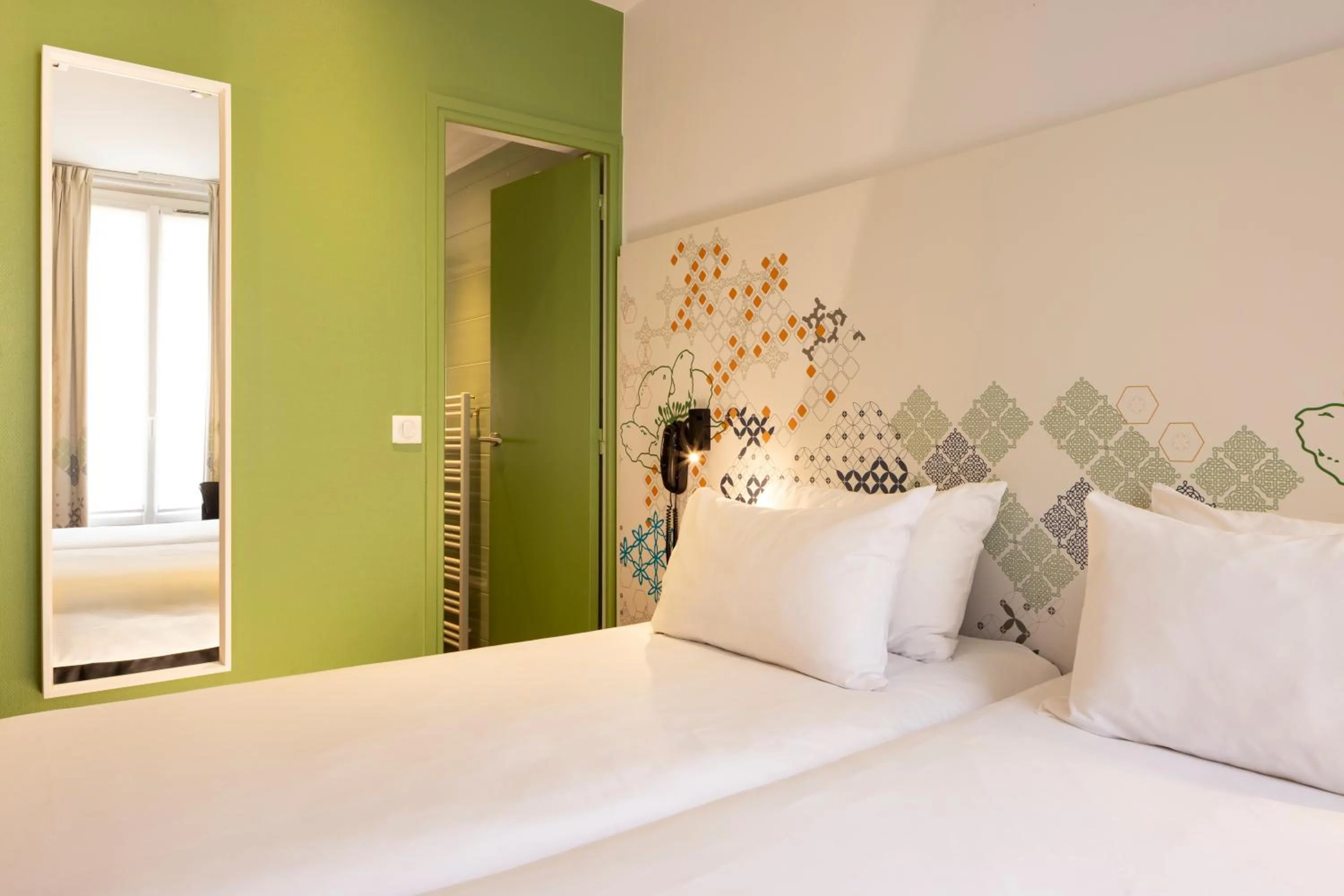 Photo of the whole room, Bed in Ibis Styles Paris Gare Saint Lazare