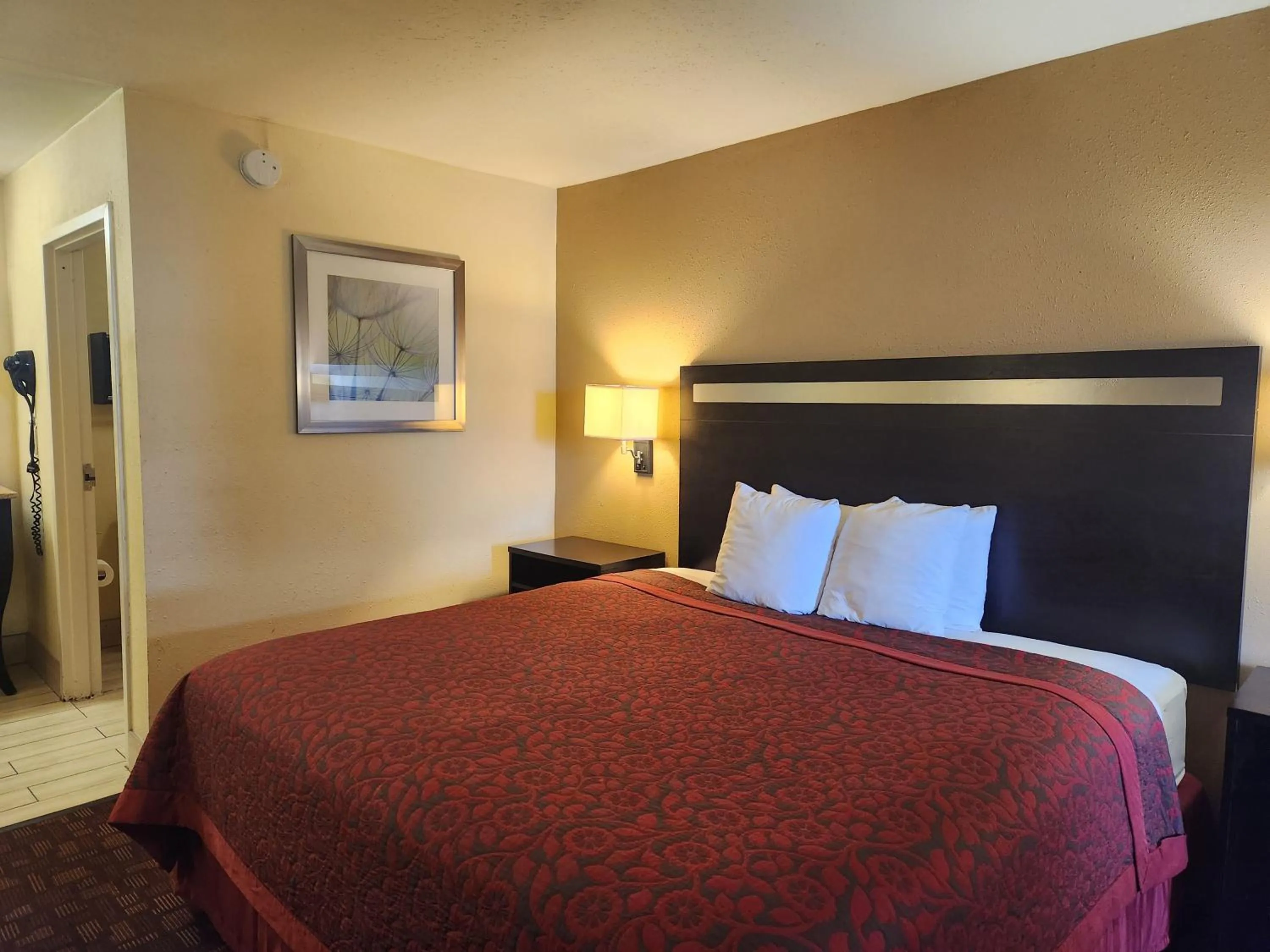 Bedroom, Bed in Days Inn by Wyndham Hammond