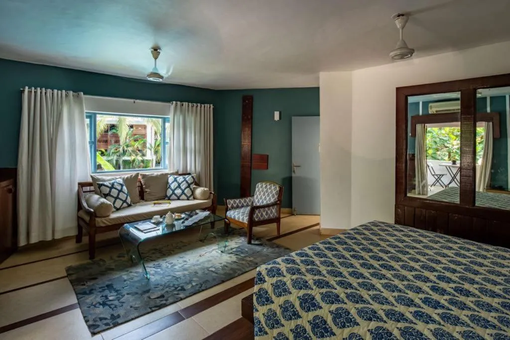 Seating area, Bed in Casa Vagator