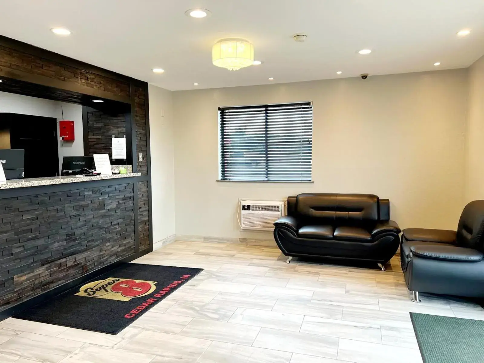 Lobby or reception in Super 8 by Wyndham Cedar Rapids Lobby or reception in Super 8 by Wyndham Cedar Rapids