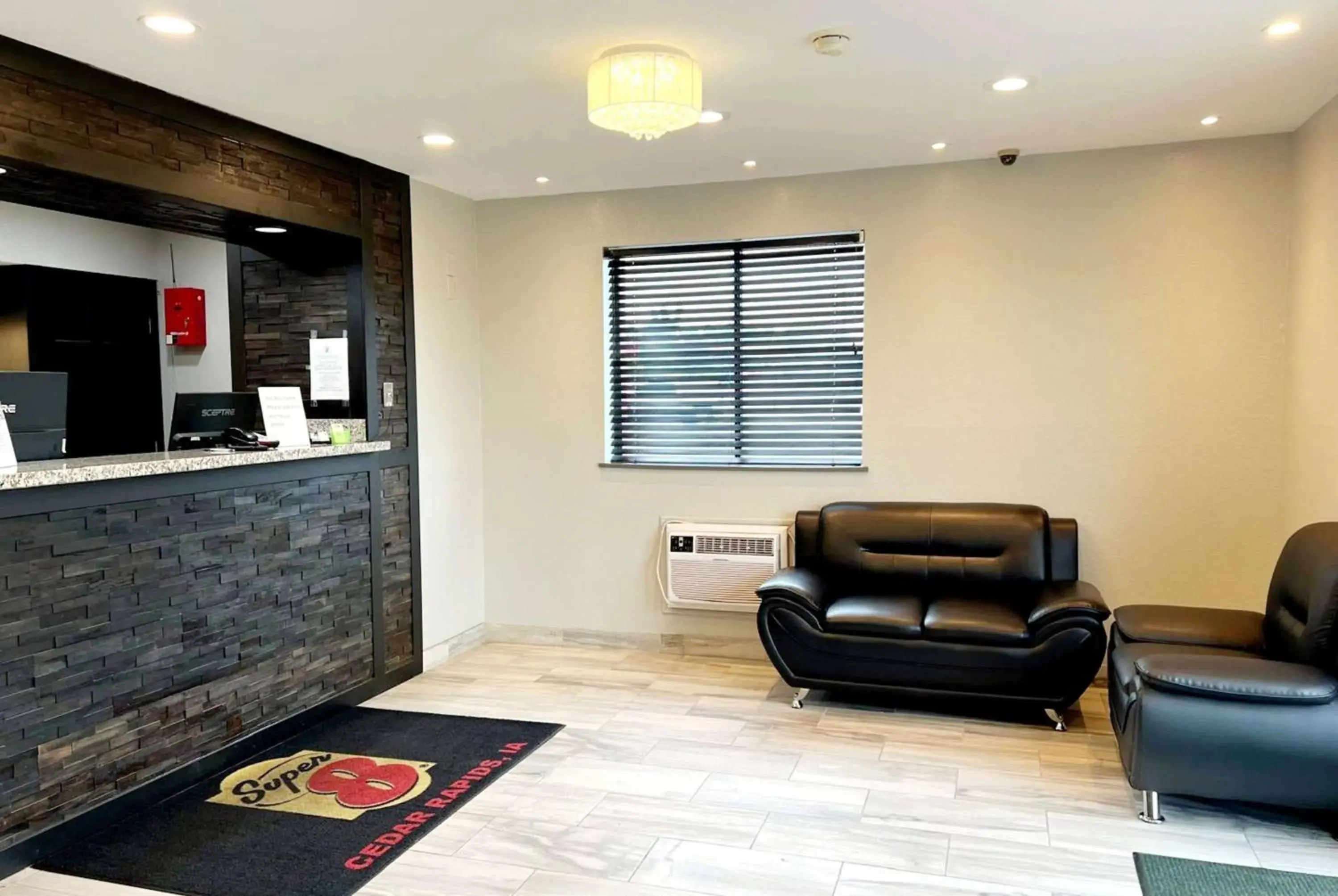 Lobby or reception in Super 8 by Wyndham Cedar Rapids Lobby or reception in Super 8 by Wyndham Cedar Rapids