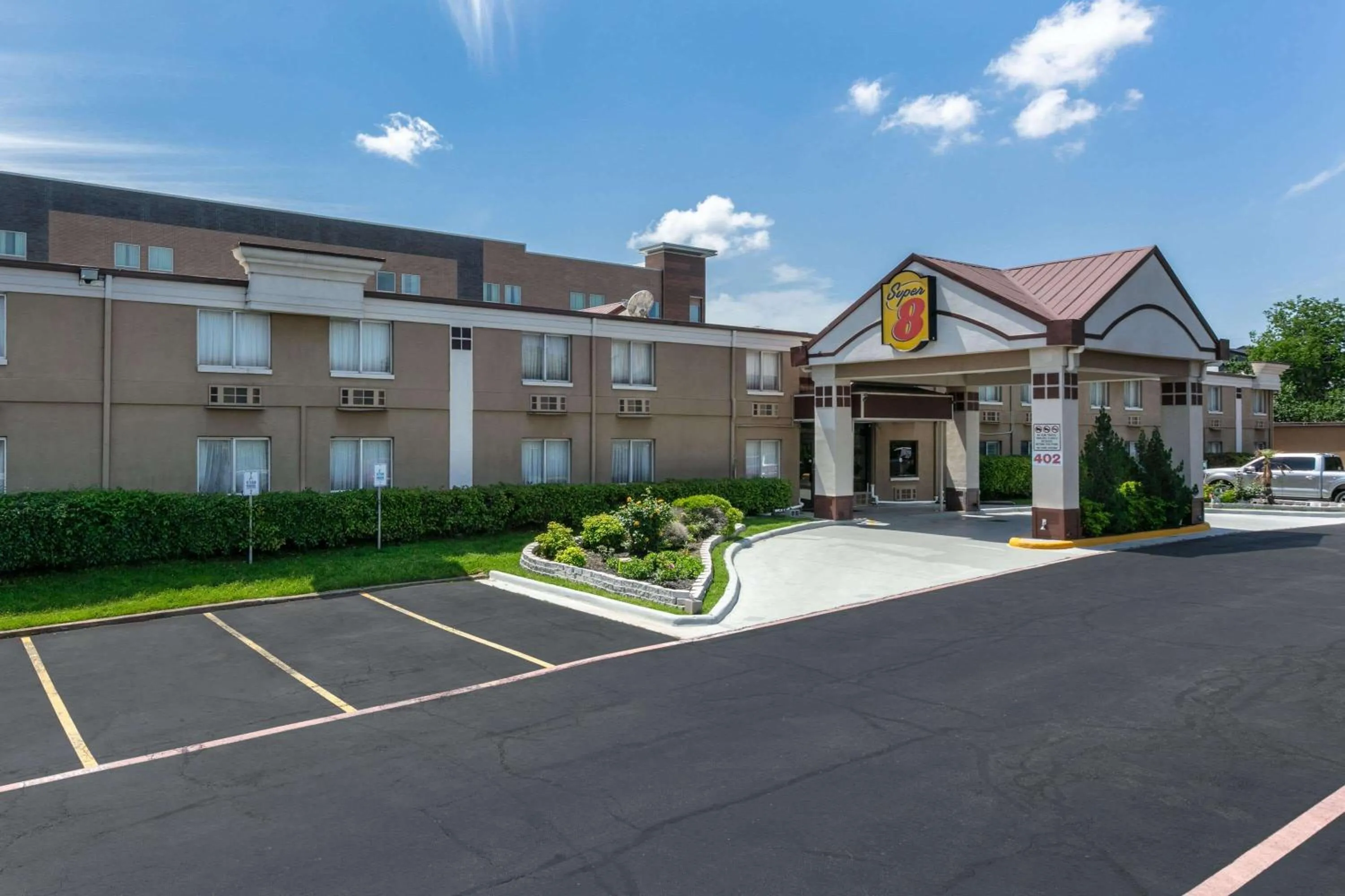 Property building in Super 8 by Wyndham Grand Prairie North