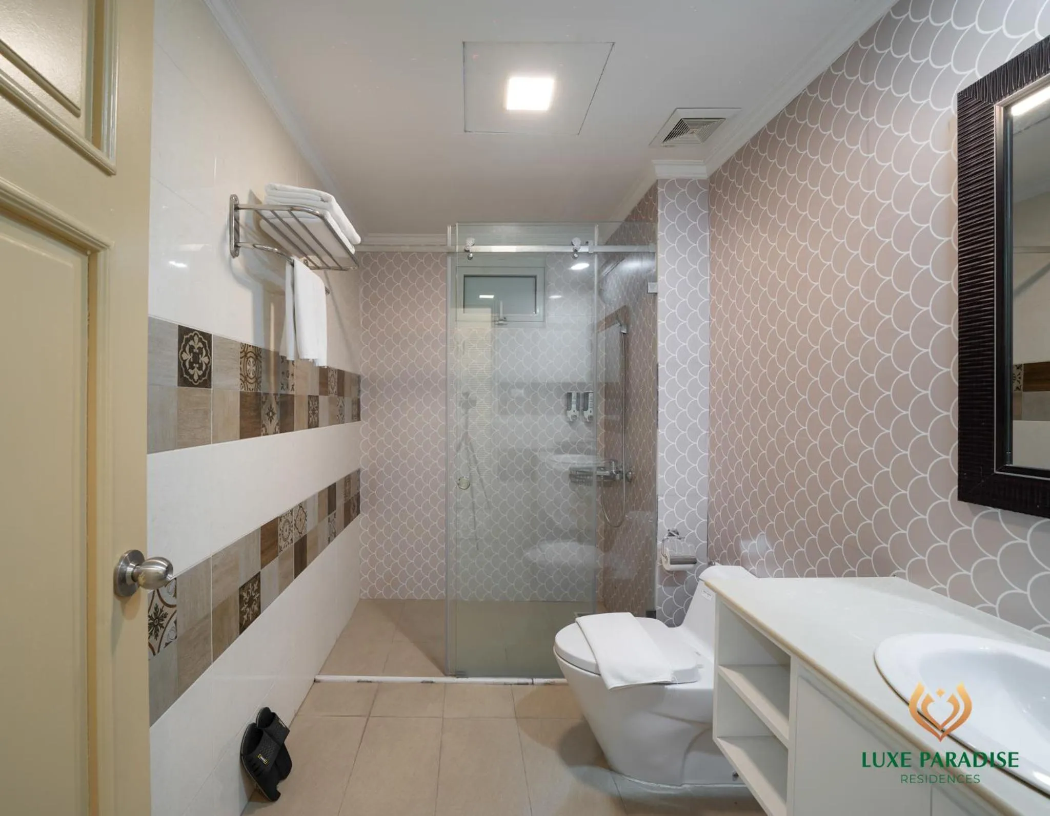 Toilet in Libra Hotel Residence by Luxe Paradise