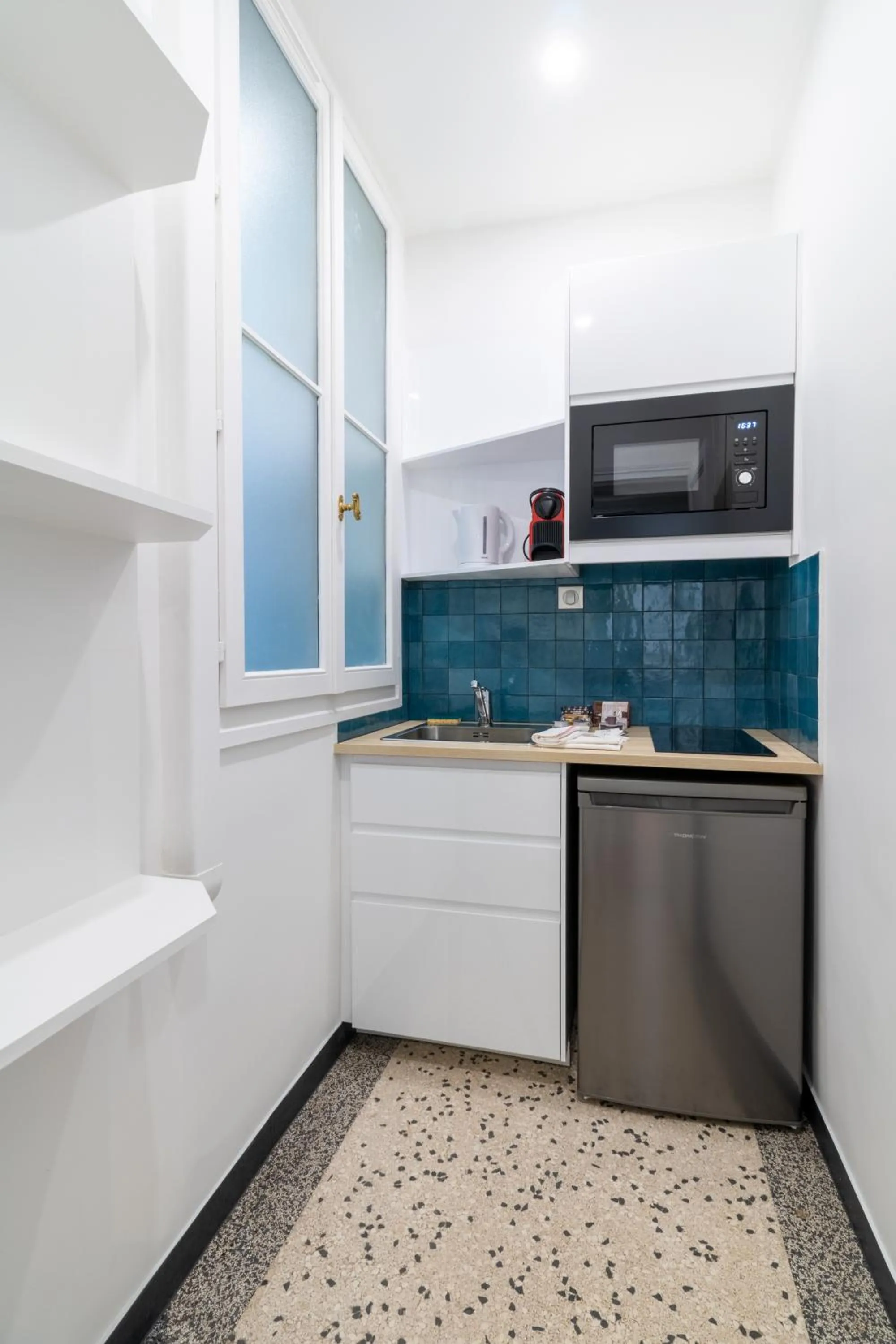 Coffee/tea facilities in HotelHome Paris 16