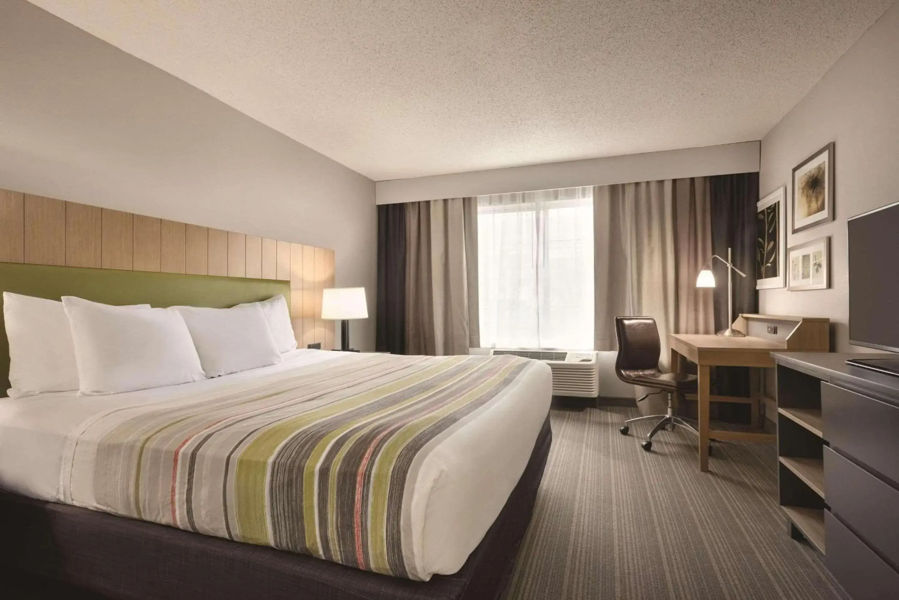 Bedroom, Bed in Country Inn & Suites by Radisson, Merrillville, IN Bedroom, Bed in Country Inn & Suites by Radisson, Merrillville, IN