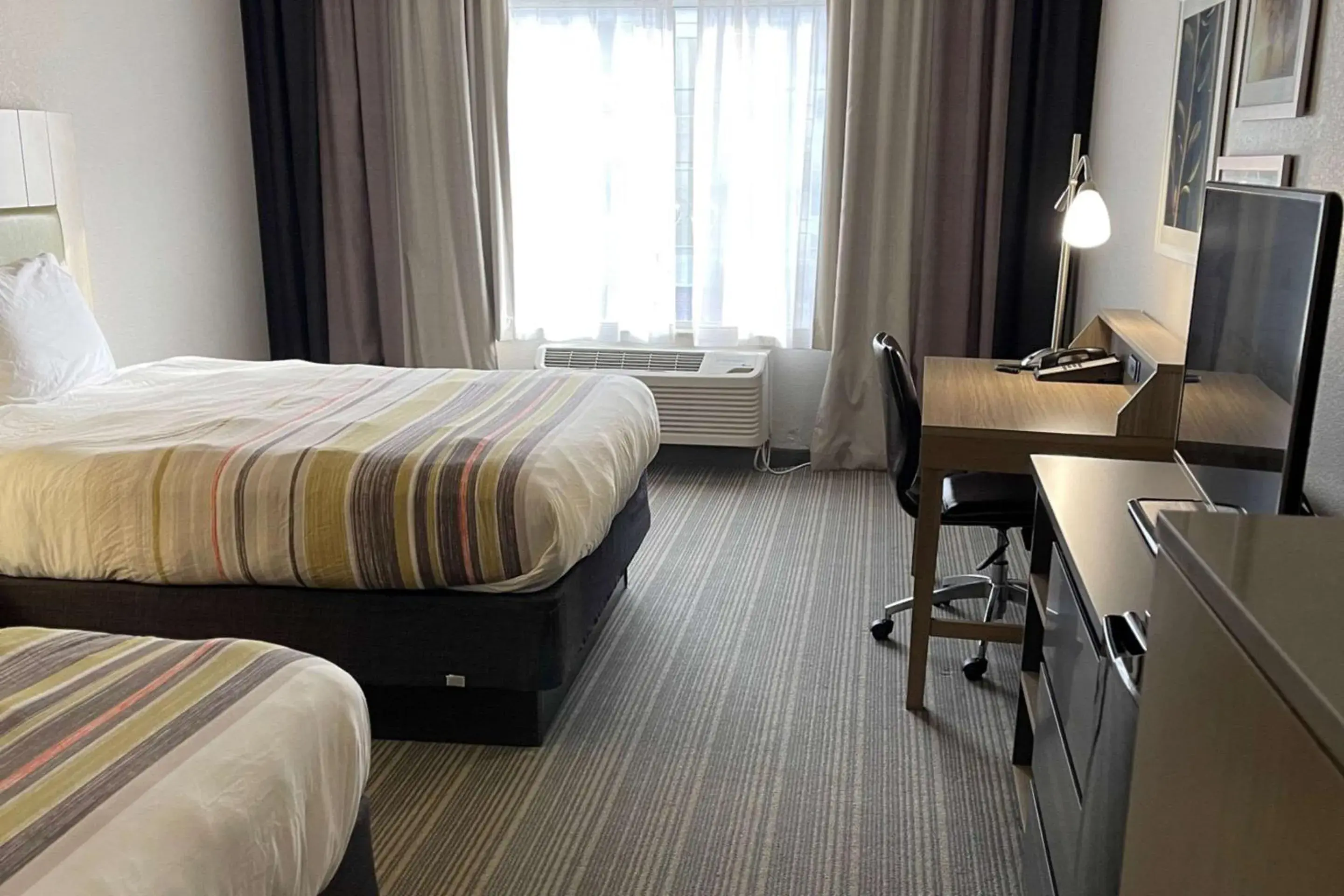 Bedroom, Bed in Country Inn & Suites by Radisson, Merrillville, IN Bedroom, Bed in Country Inn & Suites by Radisson, Merrillville, IN